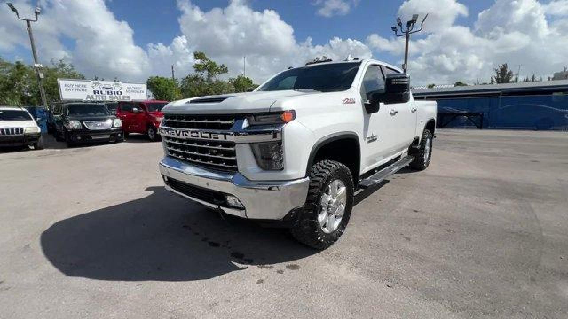 2020 Iridescent Pearl Tricoat /Jet Black Chevrolet Silverado 2500HD (1GC4YPEY0LF) with an 8 6.6L engine, Automatic transmission, located at 27610 S Dixie Hwy, Homestead, FL, 33032, (305) 749-2348, 25.510241, -80.438301 - This Chevrolet Silverado 2500HD boasts a Turbocharged Diesel V8 6.6L/403 engine powering this Automatic transmission. Z71 OFF-ROAD PACKAGE includes (Z71) Off-Road suspension with off-road tuned twin tube Rancho shocks, (JHD) Hill Descent Control and (NZZ) skid plates (transfer case and oil pan) Incl - Photo#0