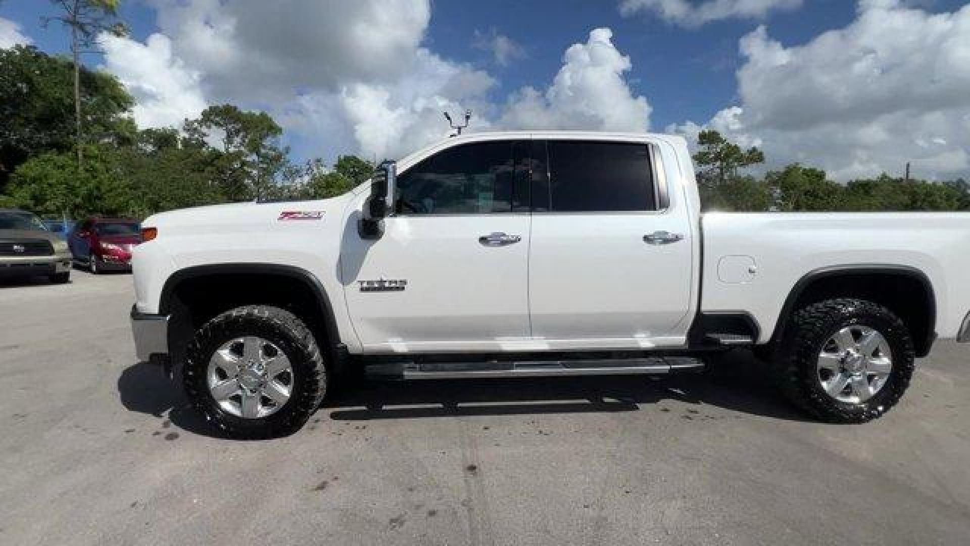 2020 Iridescent Pearl Tricoat /Jet Black Chevrolet Silverado 2500HD (1GC4YPEY0LF) with an 8 6.6L engine, Automatic transmission, located at 27610 S Dixie Hwy, Homestead, FL, 33032, (305) 749-2348, 25.510241, -80.438301 - This Chevrolet Silverado 2500HD boasts a Turbocharged Diesel V8 6.6L/403 engine powering this Automatic transmission. Z71 OFF-ROAD PACKAGE includes (Z71) Off-Road suspension with off-road tuned twin tube Rancho shocks, (JHD) Hill Descent Control and (NZZ) skid plates (transfer case and oil pan) Incl - Photo#1