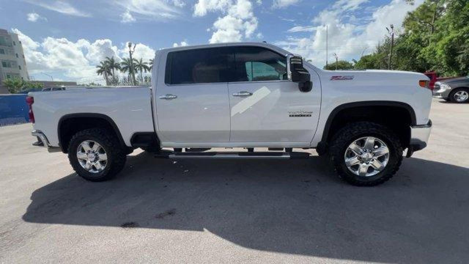 2020 Iridescent Pearl Tricoat /Jet Black Chevrolet Silverado 2500HD (1GC4YPEY0LF) with an 8 6.6L engine, Automatic transmission, located at 27610 S Dixie Hwy, Homestead, FL, 33032, (305) 749-2348, 25.510241, -80.438301 - This Chevrolet Silverado 2500HD boasts a Turbocharged Diesel V8 6.6L/403 engine powering this Automatic transmission. Z71 OFF-ROAD PACKAGE includes (Z71) Off-Road suspension with off-road tuned twin tube Rancho shocks, (JHD) Hill Descent Control and (NZZ) skid plates (transfer case and oil pan) Incl - Photo#5