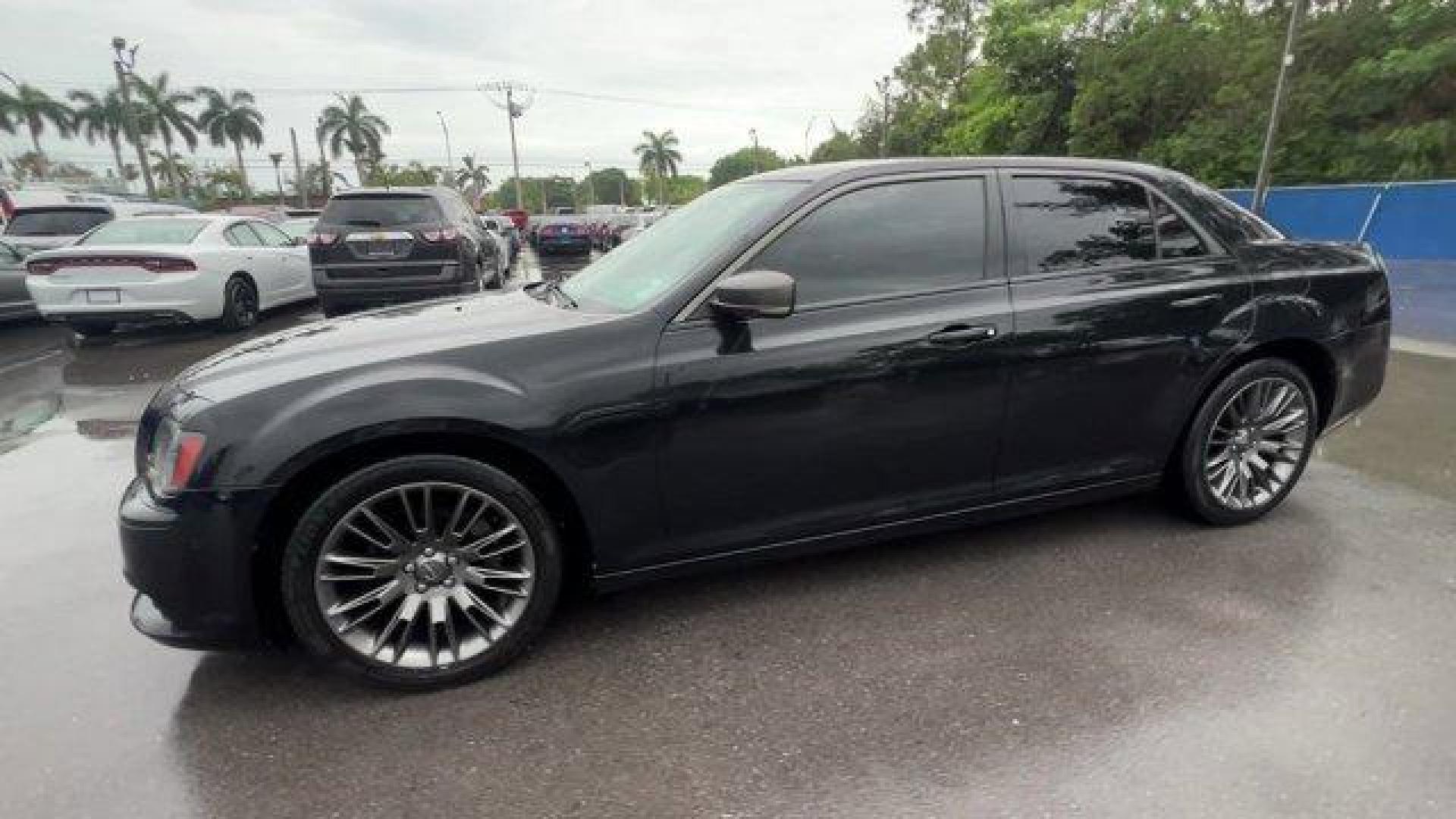 2014 Phantom Black Tri-Coat Pearl /Pewter/Black Chrysler 300 (2C3CCADGXEH) with an 6 3.6 L engine, Automatic transmission, located at 27610 S Dixie Hwy, Homestead, FL, 33032, (305) 749-2348, 25.510241, -80.438301 - KBB.com 10 Most Comfortable Cars Under $30,000. Only 66,035 Miles! Delivers 30 Highway MPG and 19 City MPG! This Chrysler 300 delivers a Regular Unleaded V-6 3.6 L/220 engine powering this Automatic transmission. TRANSMISSION: 8-SPEED AUTOMATIC (STD), SAFETYTEC -inc: Blind Spot and Cross Path Dete - Photo#1