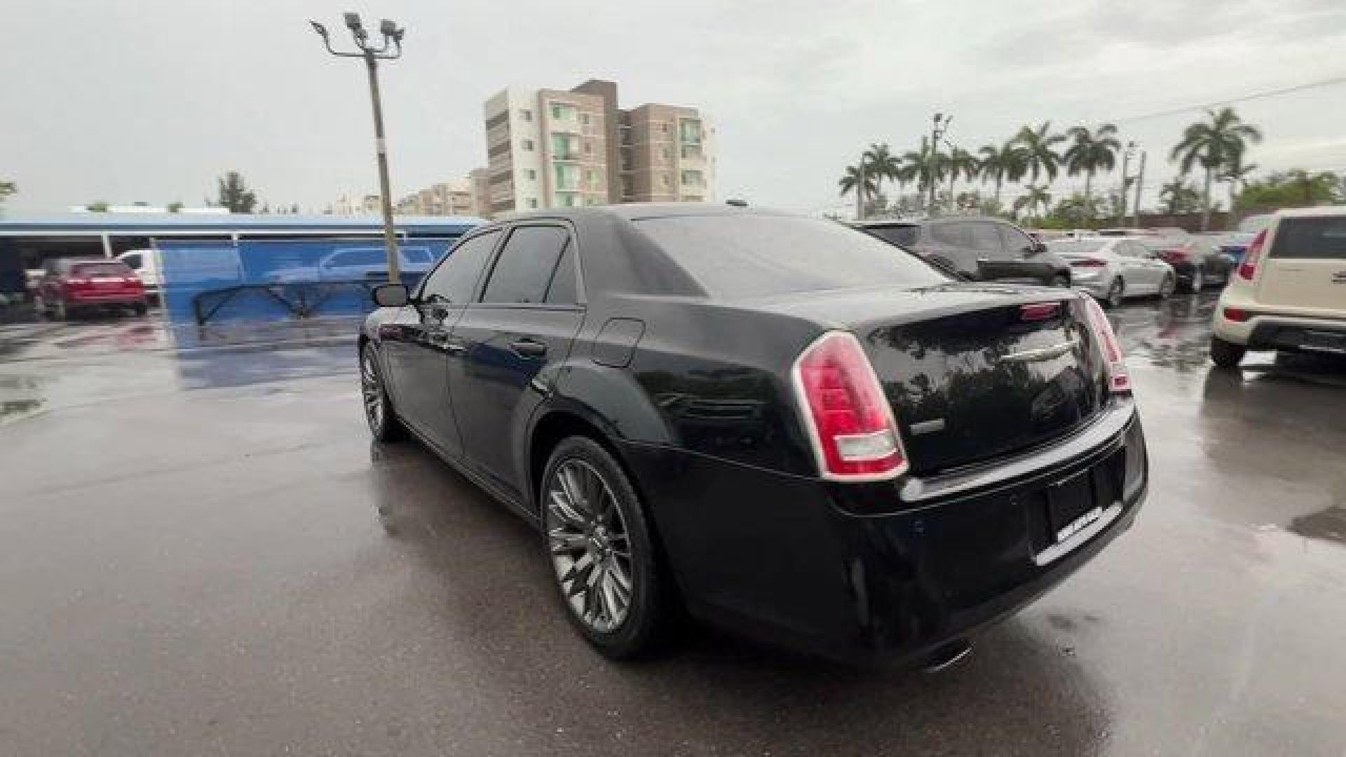 2014 Phantom Black Tri-Coat Pearl /Pewter/Black Chrysler 300 (2C3CCADGXEH) with an 6 3.6 L engine, Automatic transmission, located at 27610 S Dixie Hwy, Homestead, FL, 33032, (305) 749-2348, 25.510241, -80.438301 - KBB.com 10 Most Comfortable Cars Under $30,000. Only 66,035 Miles! Delivers 30 Highway MPG and 19 City MPG! This Chrysler 300 delivers a Regular Unleaded V-6 3.6 L/220 engine powering this Automatic transmission. TRANSMISSION: 8-SPEED AUTOMATIC (STD), SAFETYTEC -inc: Blind Spot and Cross Path Dete - Photo#2