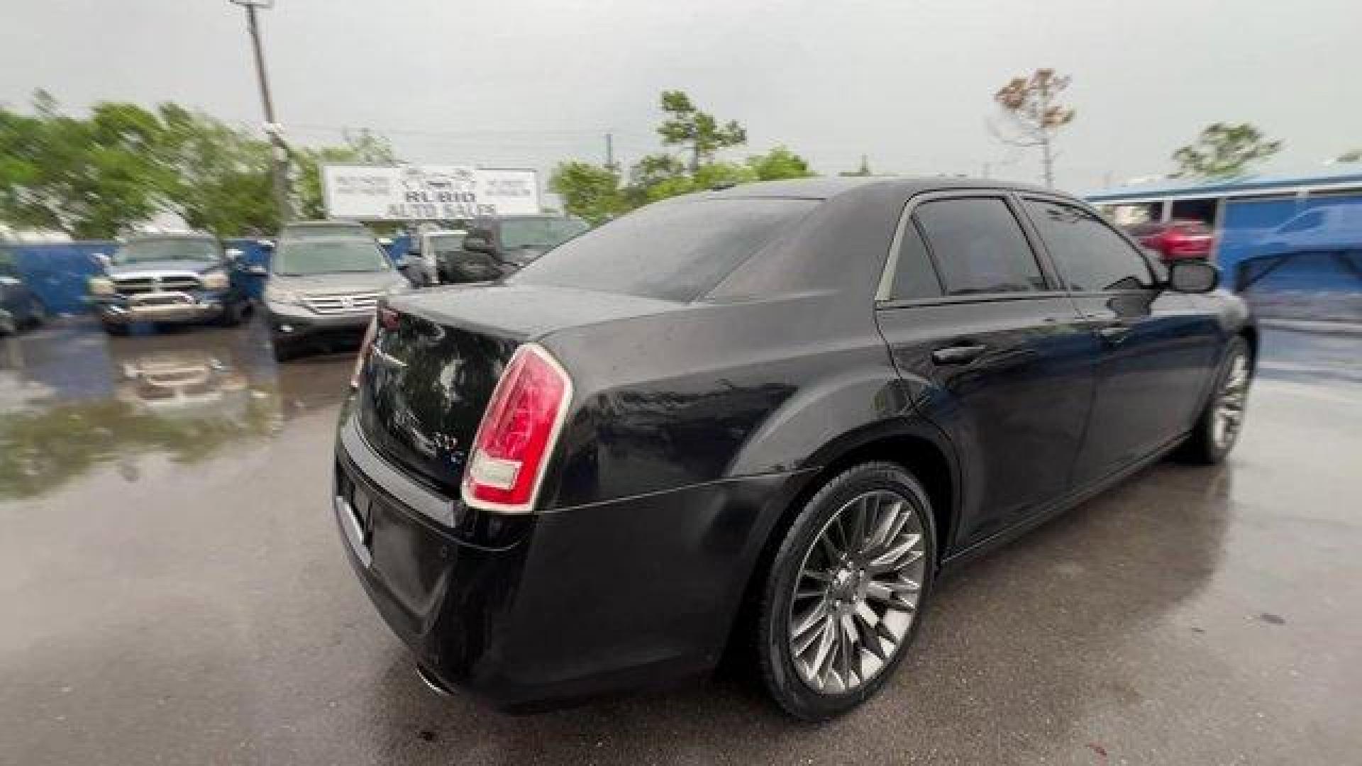 2014 Phantom Black Tri-Coat Pearl /Pewter/Black Chrysler 300 (2C3CCADGXEH) with an 6 3.6 L engine, Automatic transmission, located at 27610 S Dixie Hwy, Homestead, FL, 33032, (305) 749-2348, 25.510241, -80.438301 - KBB.com 10 Most Comfortable Cars Under $30,000. Only 66,035 Miles! Delivers 30 Highway MPG and 19 City MPG! This Chrysler 300 delivers a Regular Unleaded V-6 3.6 L/220 engine powering this Automatic transmission. TRANSMISSION: 8-SPEED AUTOMATIC (STD), SAFETYTEC -inc: Blind Spot and Cross Path Dete - Photo#4