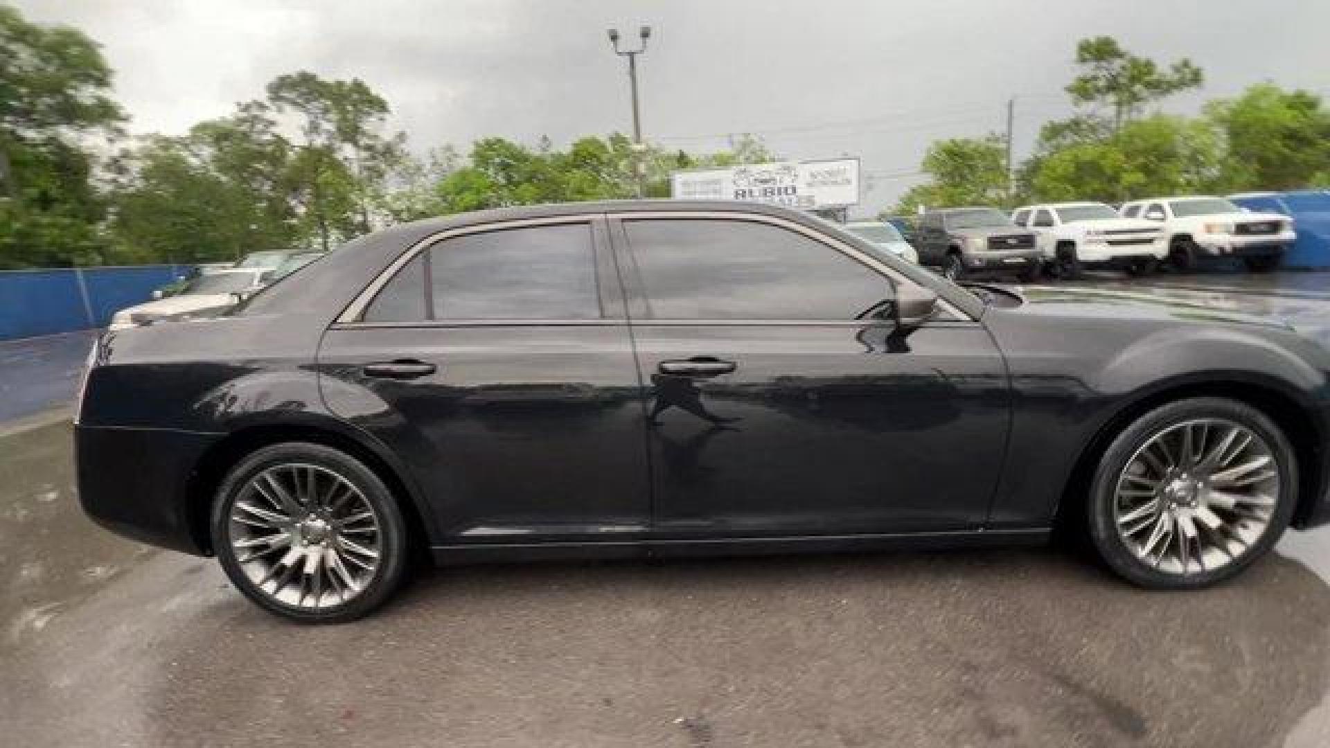 2014 Phantom Black Tri-Coat Pearl /Pewter/Black Chrysler 300 (2C3CCADGXEH) with an 6 3.6 L engine, Automatic transmission, located at 27610 S Dixie Hwy, Homestead, FL, 33032, (305) 749-2348, 25.510241, -80.438301 - KBB.com 10 Most Comfortable Cars Under $30,000. Only 66,035 Miles! Delivers 30 Highway MPG and 19 City MPG! This Chrysler 300 delivers a Regular Unleaded V-6 3.6 L/220 engine powering this Automatic transmission. TRANSMISSION: 8-SPEED AUTOMATIC (STD), SAFETYTEC -inc: Blind Spot and Cross Path Dete - Photo#5