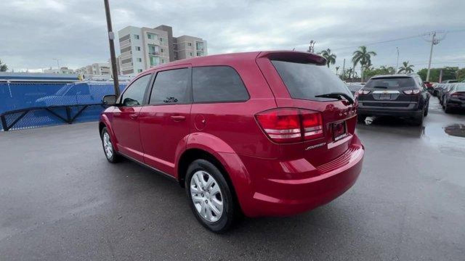 2014 Redline 2 Coat Pearl /Black Dodge Journey (3C4PDCAB8ET) with an 4 2.4 L engine, Automatic transmission, located at 27610 S Dixie Hwy, Homestead, FL, 33032, (305) 749-2348, 25.510241, -80.438301 - Delivers 26 Highway MPG and 19 City MPG! This Dodge Journey boasts a Regular Unleaded I-4 2.4 L/144 engine powering this Automatic transmission. TRANSMISSION: 4-SPEED AUTOMATIC VLP (STD), TIRES: P225/65R17 BSW A/S TOURING (STD), REDLINE 2 COAT PEARL.*This Dodge Journey Comes Equipped with These Opti - Photo#2