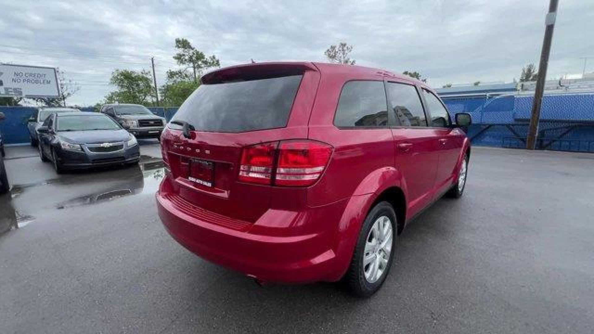 2014 Redline 2 Coat Pearl /Black Dodge Journey (3C4PDCAB8ET) with an 4 2.4 L engine, Automatic transmission, located at 27610 S Dixie Hwy, Homestead, FL, 33032, (305) 749-2348, 25.510241, -80.438301 - Delivers 26 Highway MPG and 19 City MPG! This Dodge Journey boasts a Regular Unleaded I-4 2.4 L/144 engine powering this Automatic transmission. TRANSMISSION: 4-SPEED AUTOMATIC VLP (STD), TIRES: P225/65R17 BSW A/S TOURING (STD), REDLINE 2 COAT PEARL.*This Dodge Journey Comes Equipped with These Opti - Photo#4