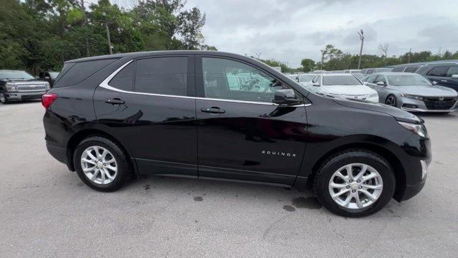 2019 Mosaic Black Metallic /Jet Black Chevrolet Equinox (2GNAXKEV6K6) with an 4 1.5L engine, Automatic transmission, located at 27610 S Dixie Hwy, Homestead, FL, 33032, (305) 749-2348, 25.510241, -80.438301 - KBB.com 10 Best SUVs Under $30,000. Only 39,409 Miles! Boasts 32 Highway MPG and 26 City MPG! This Chevrolet Equinox delivers a Turbocharged Gas I4 1.5L/92 engine powering this Automatic transmission. WHEELS, 17 (43.2 CM) ALUMINUM (STD), TRANSMISSION, 6-SPEED AUTOMATIC, ELECTRONICALLY-CONTROLLED WIT - Photo#5