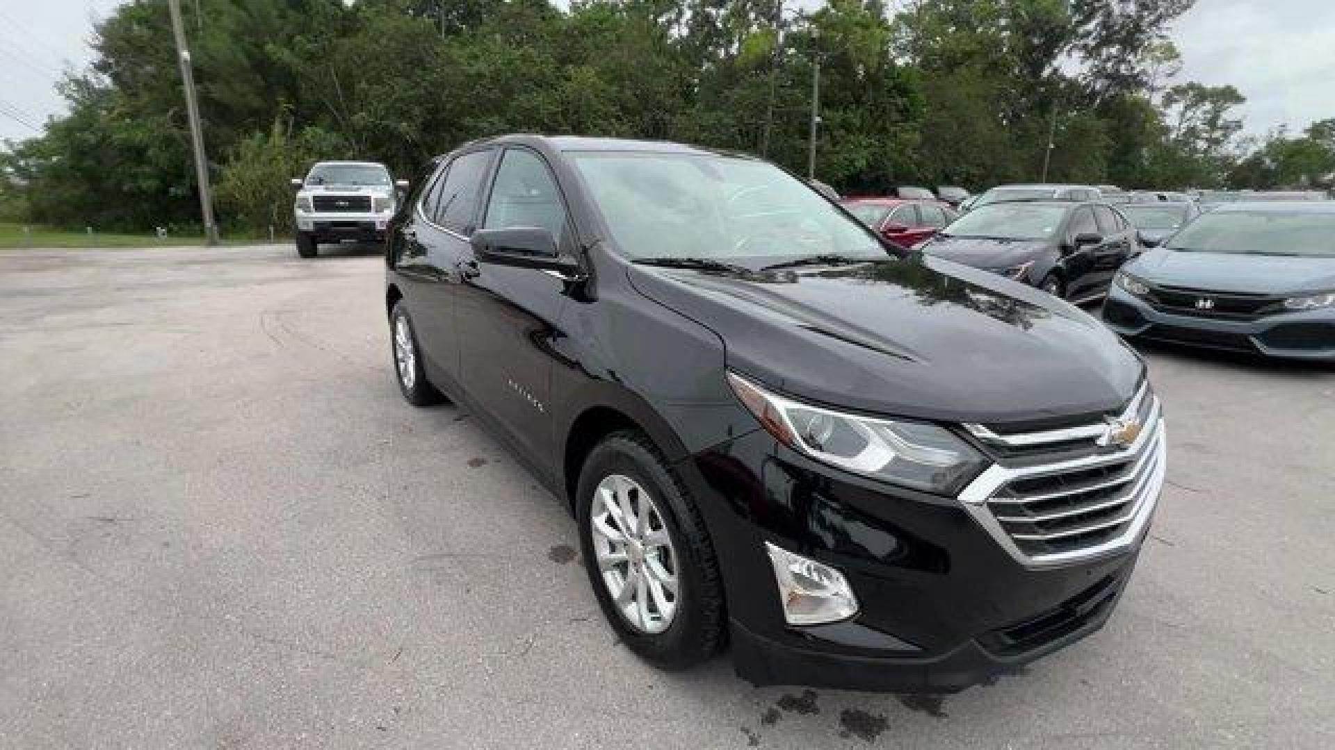 2019 Mosaic Black Metallic /Jet Black Chevrolet Equinox (2GNAXKEV6K6) with an 4 1.5L engine, Automatic transmission, located at 27610 S Dixie Hwy, Homestead, FL, 33032, (305) 749-2348, 25.510241, -80.438301 - KBB.com 10 Best SUVs Under $30,000. Only 39,409 Miles! Boasts 32 Highway MPG and 26 City MPG! This Chevrolet Equinox delivers a Turbocharged Gas I4 1.5L/92 engine powering this Automatic transmission. WHEELS, 17 (43.2 CM) ALUMINUM (STD), TRANSMISSION, 6-SPEED AUTOMATIC, ELECTRONICALLY-CONTROLLED WIT - Photo#6