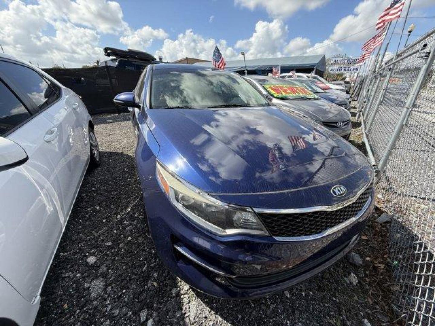 2017 Horizon Blue /Black Kia Optima (5XXGT4L39HG) with an 4 2.4 L engine, Automatic transmission, located at 27610 S Dixie Hwy, Homestead, FL, 33032, (305) 749-2348, 25.510241, -80.438301 - IIHS Top Safety Pick. Scores 36 Highway MPG and 25 City MPG! This Kia Optima boasts a Regular Unleaded I-4 2.4 L/144 engine powering this Automatic transmission. WHEELS: 17 ALLOY -inc: Tires: 17 (Fleet), HORIZON BLUE, CARPETED FLOOR MATS.* This Kia Optima Features the Following Options *BLACK, CLOTH - Photo#0