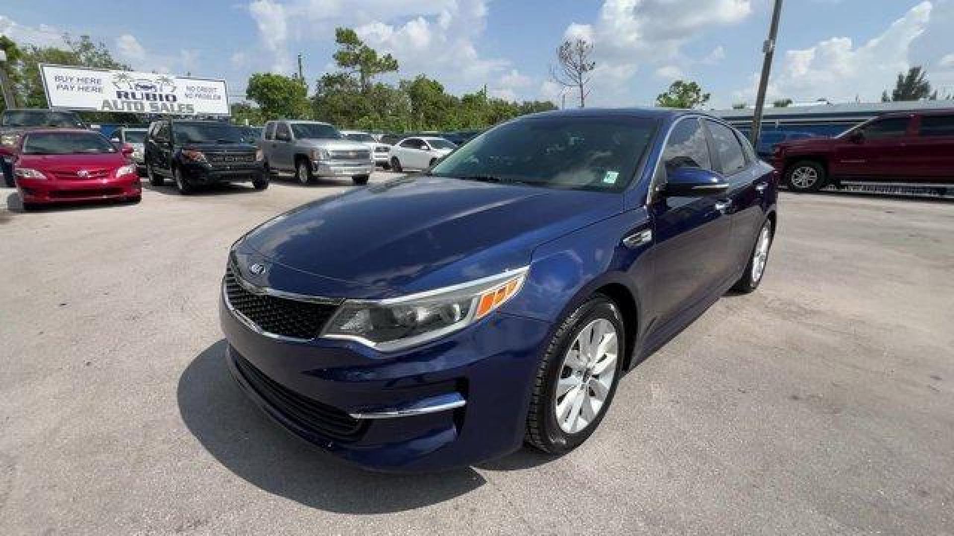 2017 Horizon Blue /Black Kia Optima (5XXGT4L39HG) with an 4 2.4 L engine, Automatic transmission, located at 27610 S Dixie Hwy, Homestead, FL, 33032, (305) 749-2348, 25.510241, -80.438301 - IIHS Top Safety Pick. Scores 36 Highway MPG and 25 City MPG! This Kia Optima boasts a Regular Unleaded I-4 2.4 L/144 engine powering this Automatic transmission. WHEELS: 17 ALLOY -inc: Tires: 17 (Fleet), HORIZON BLUE, CARPETED FLOOR MATS.* This Kia Optima Features the Following Options *BLACK, CLOTH - Photo#0