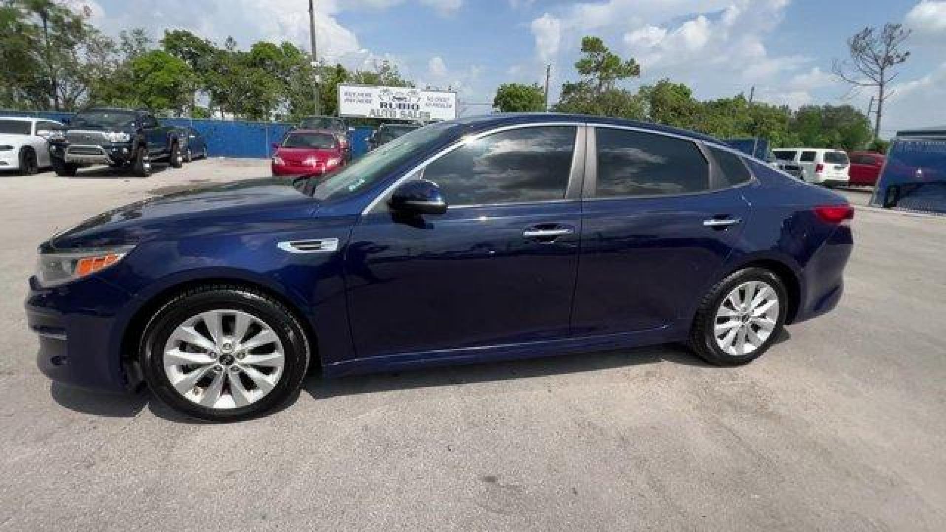 2017 Horizon Blue /Black Kia Optima (5XXGT4L39HG) with an 4 2.4 L engine, Automatic transmission, located at 27610 S Dixie Hwy, Homestead, FL, 33032, (305) 749-2348, 25.510241, -80.438301 - IIHS Top Safety Pick. Scores 36 Highway MPG and 25 City MPG! This Kia Optima boasts a Regular Unleaded I-4 2.4 L/144 engine powering this Automatic transmission. WHEELS: 17 ALLOY -inc: Tires: 17 (Fleet), HORIZON BLUE, CARPETED FLOOR MATS.* This Kia Optima Features the Following Options *BLACK, CLOTH - Photo#1