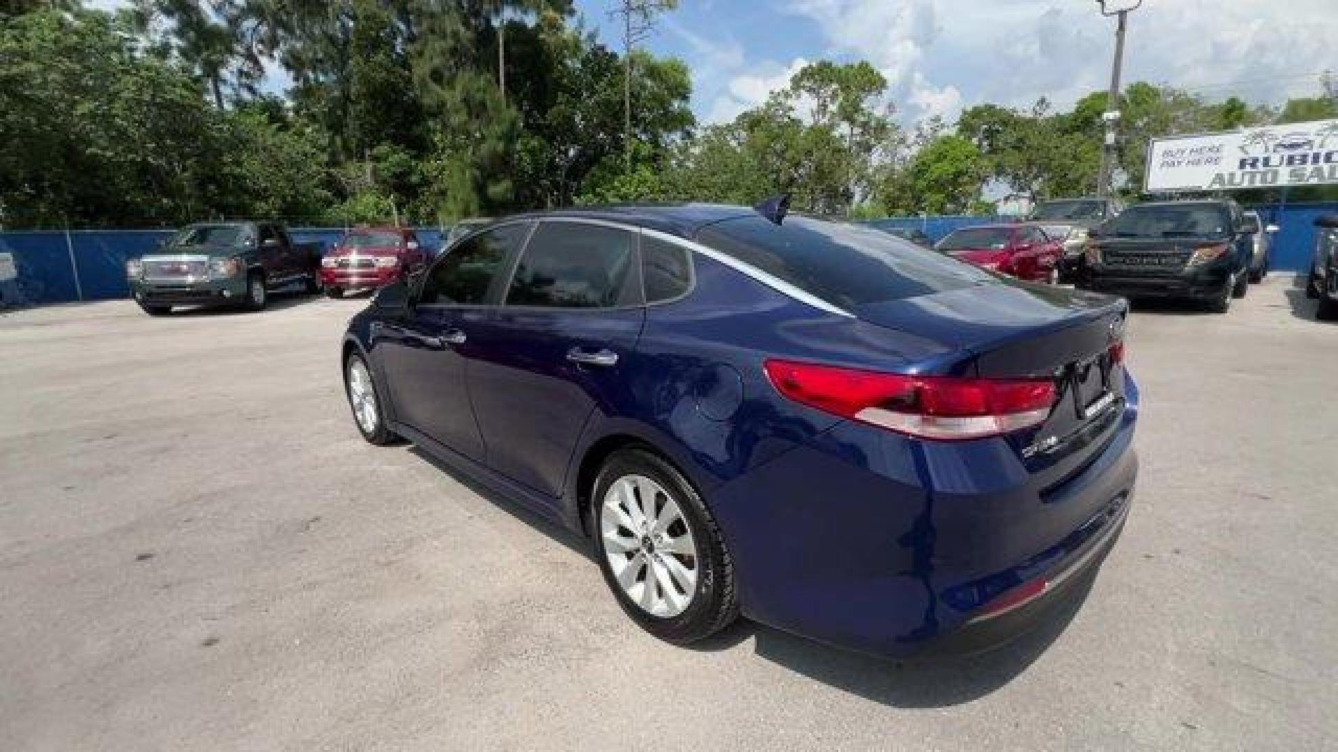 2017 Horizon Blue /Black Kia Optima (5XXGT4L39HG) with an 4 2.4 L engine, Automatic transmission, located at 27610 S Dixie Hwy, Homestead, FL, 33032, (305) 749-2348, 25.510241, -80.438301 - IIHS Top Safety Pick. Scores 36 Highway MPG and 25 City MPG! This Kia Optima boasts a Regular Unleaded I-4 2.4 L/144 engine powering this Automatic transmission. WHEELS: 17 ALLOY -inc: Tires: 17 (Fleet), HORIZON BLUE, CARPETED FLOOR MATS.* This Kia Optima Features the Following Options *BLACK, CLOTH - Photo#2