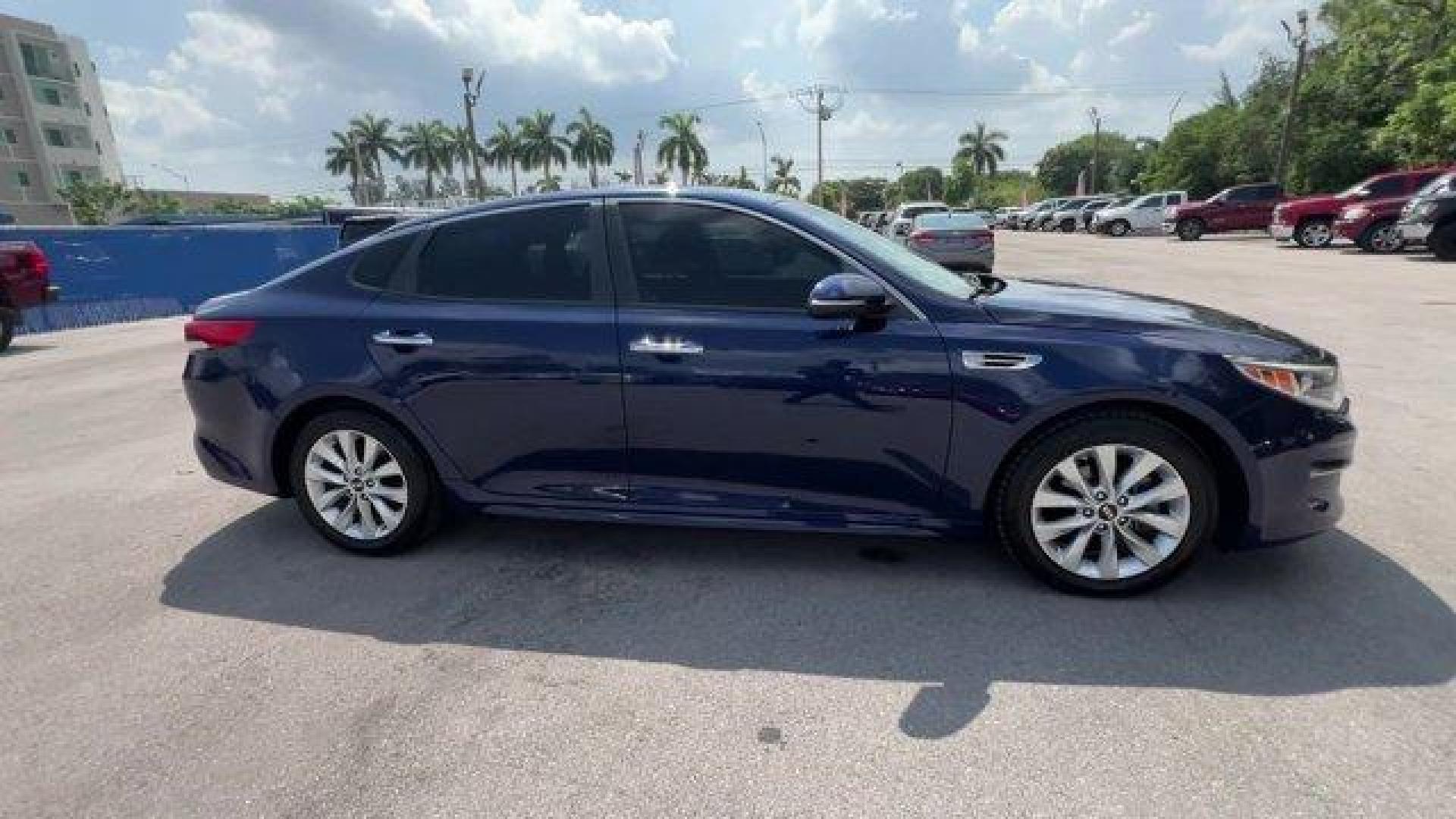 2017 Horizon Blue /Black Kia Optima (5XXGT4L39HG) with an 4 2.4 L engine, Automatic transmission, located at 27610 S Dixie Hwy, Homestead, FL, 33032, (305) 749-2348, 25.510241, -80.438301 - IIHS Top Safety Pick. Scores 36 Highway MPG and 25 City MPG! This Kia Optima boasts a Regular Unleaded I-4 2.4 L/144 engine powering this Automatic transmission. WHEELS: 17 ALLOY -inc: Tires: 17 (Fleet), HORIZON BLUE, CARPETED FLOOR MATS.* This Kia Optima Features the Following Options *BLACK, CLOTH - Photo#5