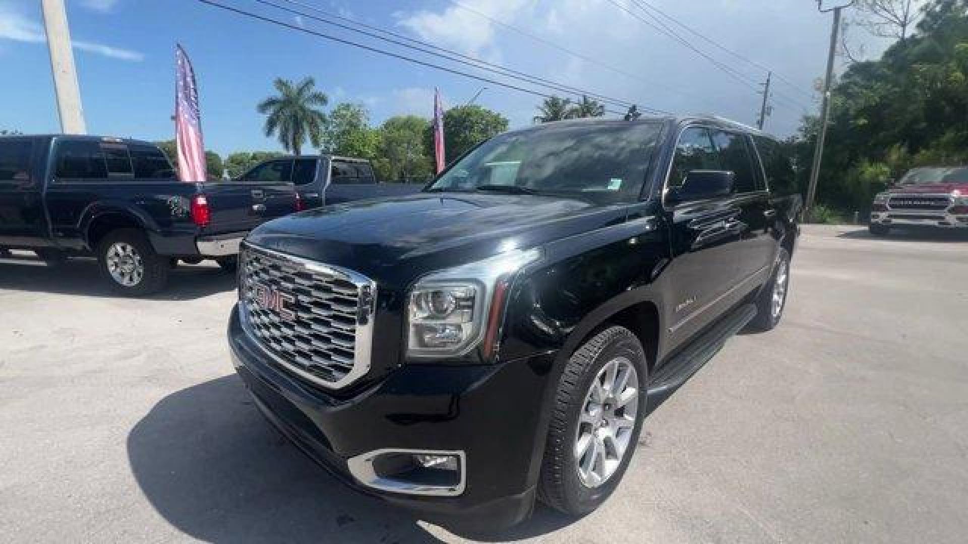 2019 Onyx Black /Jet Black GMC Yukon XL (1GKS1HKJ2KR) with an 8 6.2L engine, Automatic transmission, located at 27610 S Dixie Hwy, Homestead, FL, 33032, (305) 749-2348, 25.510241, -80.438301 - Delivers 23 Highway MPG and 14 City MPG! This GMC Yukon XL delivers a Gas V8 6.2L/376 engine powering this Automatic transmission. WHEELS, 20 X 9 (50.8 CM X 22.9 CM) BRIGHT MACHINED ALUMINUM (STD), TRANSMISSION, 10-SPEED AUTOMATIC electronically controlled with overdrive, tow/haul mode and tap up/ta - Photo#0