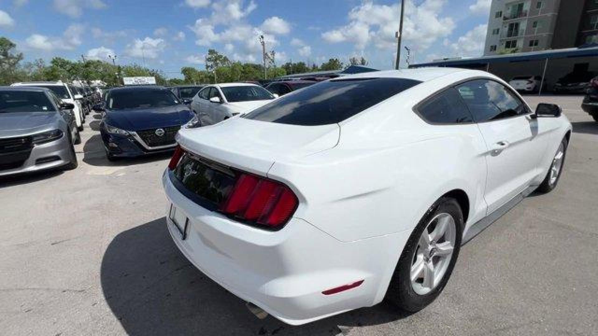 2017 White Ford Mustang (1FA6P8AMXH5) with an 6 3.7 L engine, Automatic transmission, located at 27610 S Dixie Hwy, Homestead, FL, 33032, (305) 749-2348, 25.510241, -80.438301 - KBB.com 10 Coolest Cars Under $25,000. Delivers 27 Highway MPG and 18 City MPG! This Ford Mustang boasts a Regular Unleaded V-6 3.7 L/227 engine powering this Automatic transmission. ENGINE: 3.7L TI-VCT V6 (STD), Wheels: 17 x 7.5 Sparkle Silver Painted Aluminum, Trunk Rear Cargo Access.* This Ford M - Photo#4