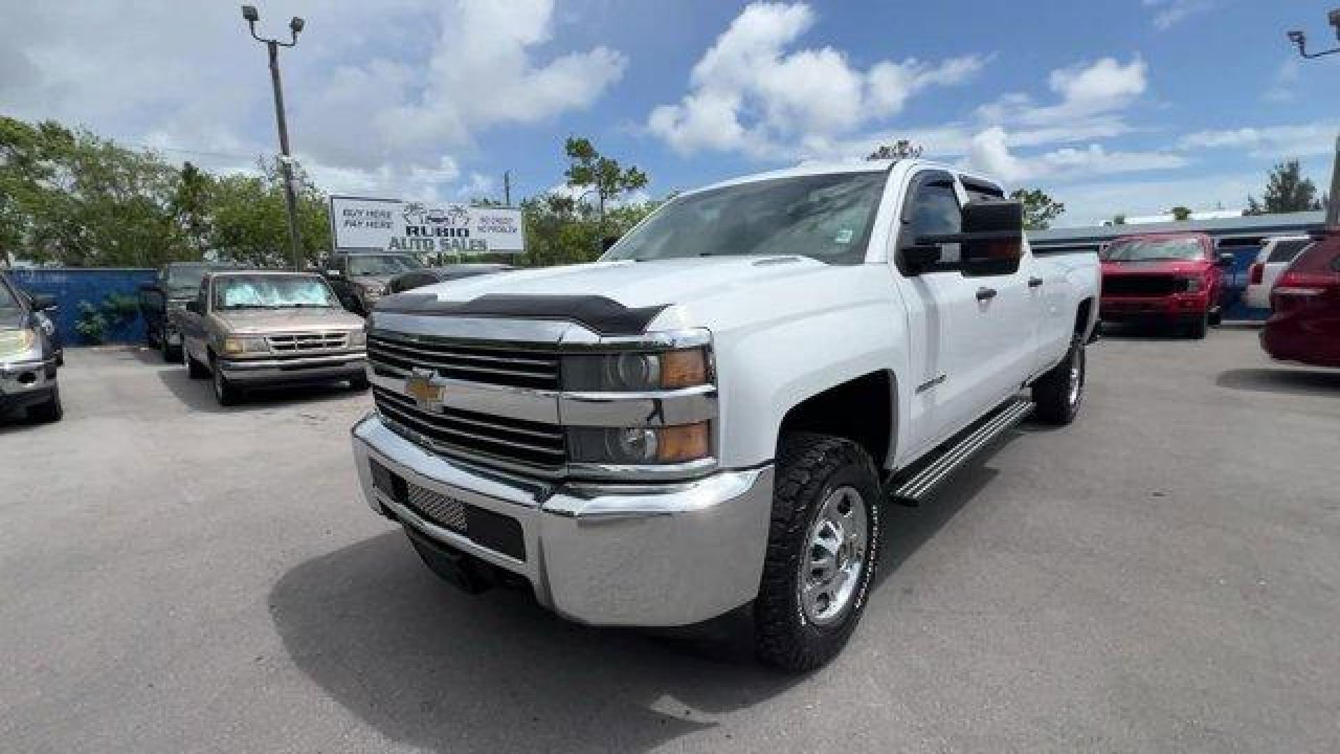 2016 Summit White /Dark Ash with Jet Black Interior Accents Chevrolet Silverado 2500HD (1GC1CUE86GF) with an 8 6.6L engine, Automatic transmission, located at 27610 S Dixie Hwy, Homestead, FL, 33032, (305) 749-2348, 25.510241, -80.438301 - Only 81,417 Miles! This Chevrolet Silverado 2500HD delivers a Turbocharged Diesel V8 6.6L/403 engine powering this Automatic transmission. WT CONVENIENCE PACKAGE includes (AKO) tinted windows, (KI4) 110V outlet, (AQQ) Remote Keyless Entry, (A91) remote locking tailgate, (UVC) Rear Vision Camera and - Photo#0