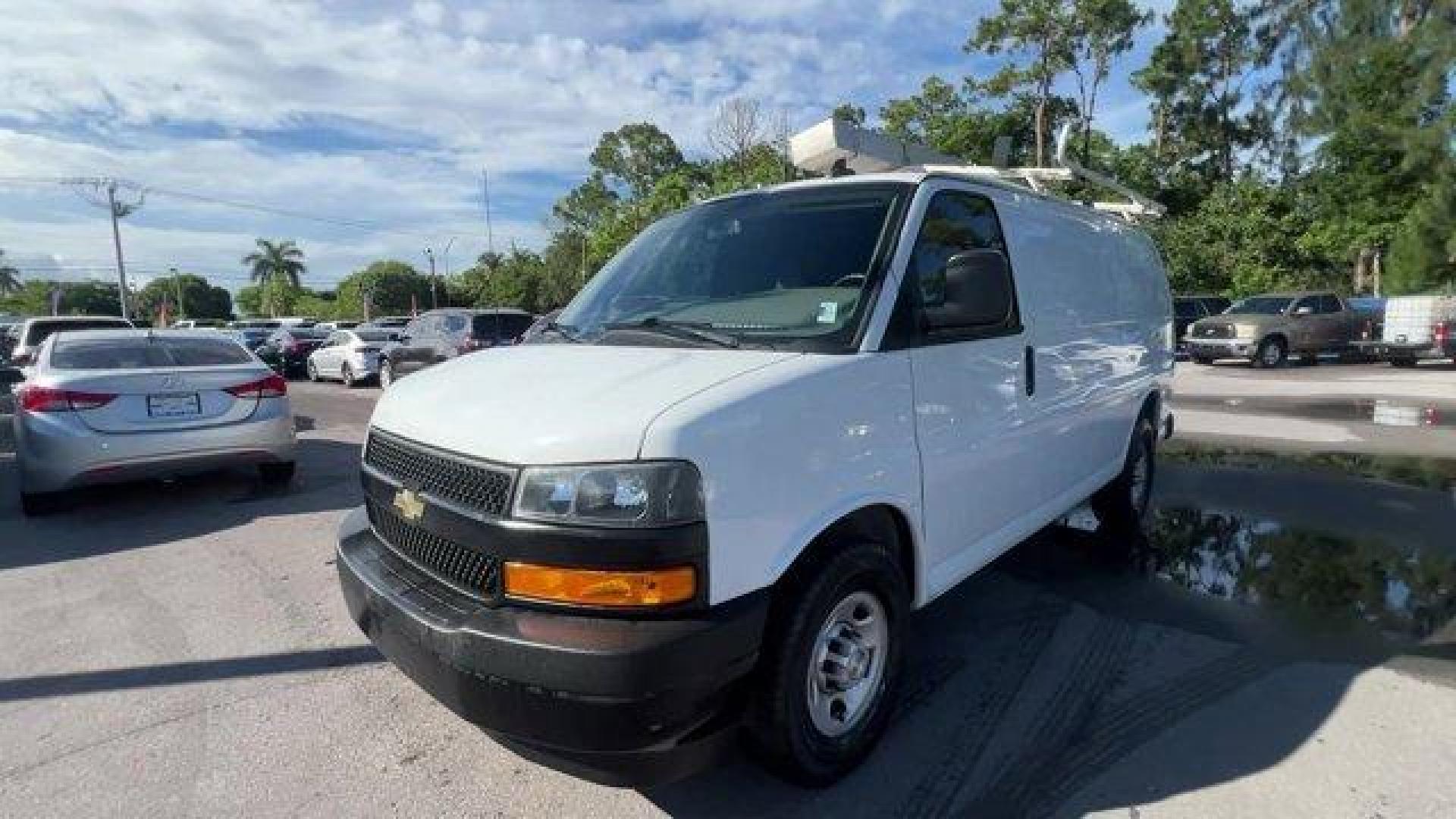 2019 Summit White /Medium Pewter Chevrolet Express Cargo Van (1GCWGAFGXK1) with an 8 6.0L engine, Automatic transmission, located at 27610 S Dixie Hwy, Homestead, FL, 33032, (305) 749-2348, 25.510241, -80.438301 - This Chevrolet Express Cargo Van boasts a Gas/Ethanol V8 6.0L/364 engine powering this Automatic transmission. VISORS, DRIVER AND FRONT PASSENGER vinyl in lieu of standard cloth, TRANSMISSION, 6-SPEED AUTOMATIC, HEAVY-DUTY, ELECTRONICALLY CONTROLLED with overdrive and tow/haul mode. Includes Cruise - Photo#0