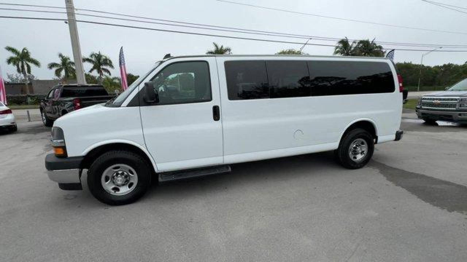 2019 Summit White /Medium Pewter Chevrolet Express Passenger (1GAZGPFP2K1) with an 6 4.3L engine, Automatic transmission, located at 27610 S Dixie Hwy, Homestead, FL, 33032, (305) 749-2348, 25.510241, -80.438301 - This Chevrolet Express Passenger delivers a Gas V6 4.3L/ engine powering this Automatic transmission. TRANSMISSION, 8-SPEED AUTOMATIC, ELECTRONICALLY CONTROLLED with overdrive and tow/haul mode. Includes Cruise Grade Braking and Powertrain Grade Braking (STD), SUMMIT WHITE, SHIP THRU, PRODUCED IN WE - Photo#1