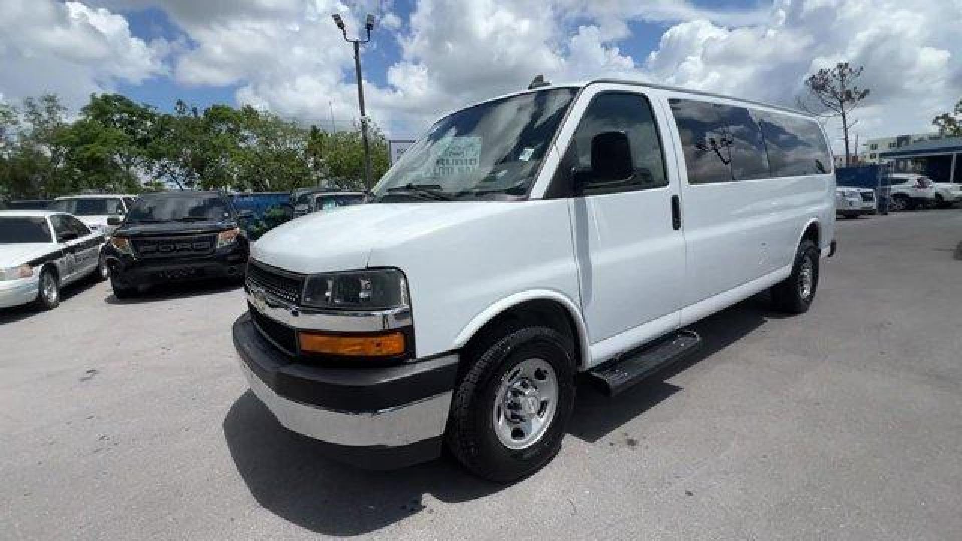 2019 Summit White /Medium Pewter Chevrolet Express Passenger (1GAZGPFP2K1) with an 6 4.3L engine, Automatic transmission, located at 27610 S Dixie Hwy, Homestead, FL, 33032, (305) 749-2348, 25.510241, -80.438301 - This Chevrolet Express Passenger delivers a Gas V6 4.3L/ engine powering this Automatic transmission. TRANSMISSION, 8-SPEED AUTOMATIC, ELECTRONICALLY CONTROLLED with overdrive and tow/haul mode. Includes Cruise Grade Braking and Powertrain Grade Braking (STD), SUMMIT WHITE, SHIP THRU, PRODUCED IN WE - Photo#0