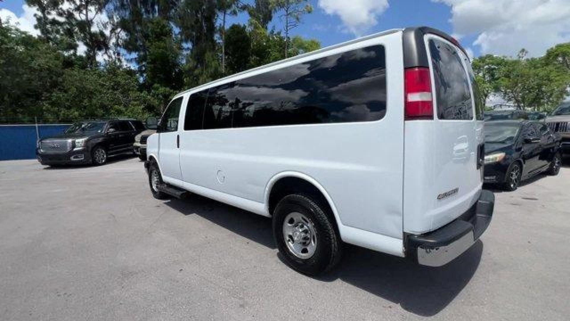 2019 Summit White /Medium Pewter Chevrolet Express Passenger (1GAZGPFP2K1) with an 6 4.3L engine, Automatic transmission, located at 27610 S Dixie Hwy, Homestead, FL, 33032, (305) 749-2348, 25.510241, -80.438301 - This Chevrolet Express Passenger delivers a Gas V6 4.3L/ engine powering this Automatic transmission. TRANSMISSION, 8-SPEED AUTOMATIC, ELECTRONICALLY CONTROLLED with overdrive and tow/haul mode. Includes Cruise Grade Braking and Powertrain Grade Braking (STD), SUMMIT WHITE, SHIP THRU, PRODUCED IN WE - Photo#3