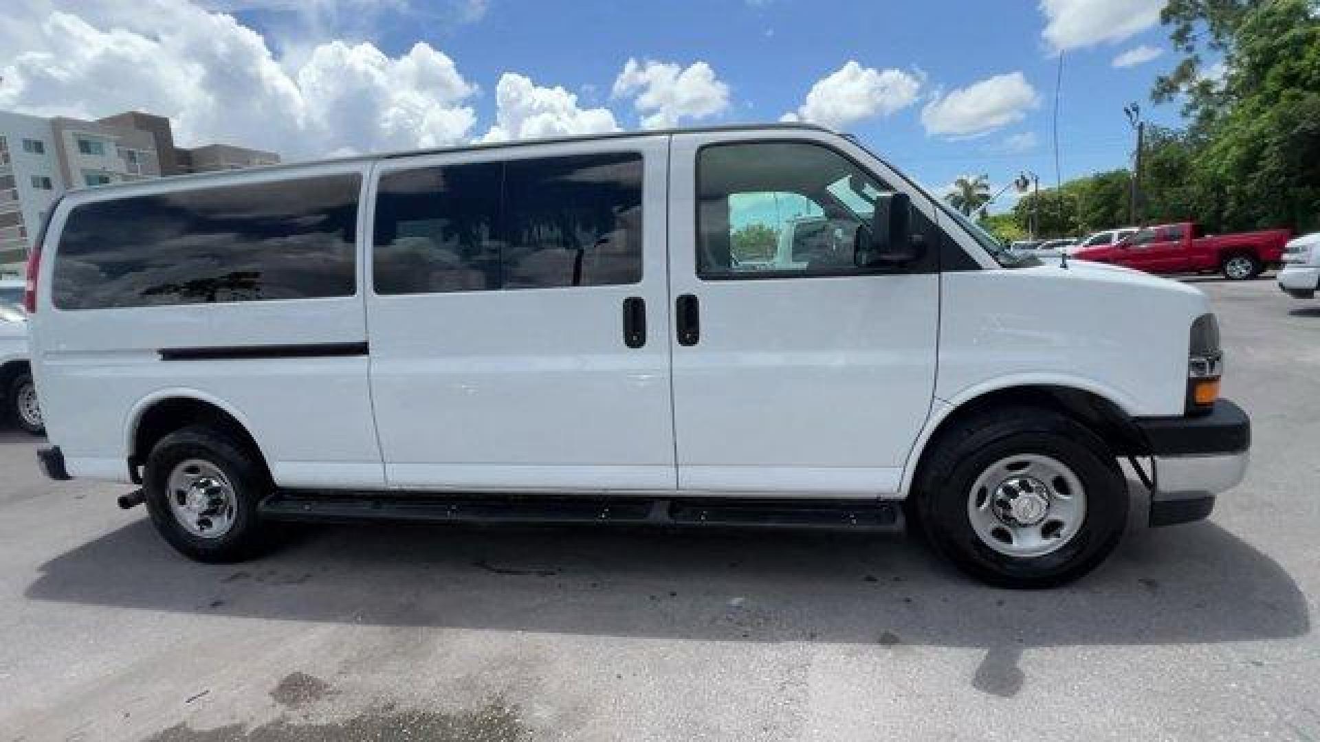 2019 Summit White /Medium Pewter Chevrolet Express Passenger (1GAZGPFP2K1) with an 6 4.3L engine, Automatic transmission, located at 27610 S Dixie Hwy, Homestead, FL, 33032, (305) 749-2348, 25.510241, -80.438301 - This Chevrolet Express Passenger delivers a Gas V6 4.3L/ engine powering this Automatic transmission. TRANSMISSION, 8-SPEED AUTOMATIC, ELECTRONICALLY CONTROLLED with overdrive and tow/haul mode. Includes Cruise Grade Braking and Powertrain Grade Braking (STD), SUMMIT WHITE, SHIP THRU, PRODUCED IN WE - Photo#5