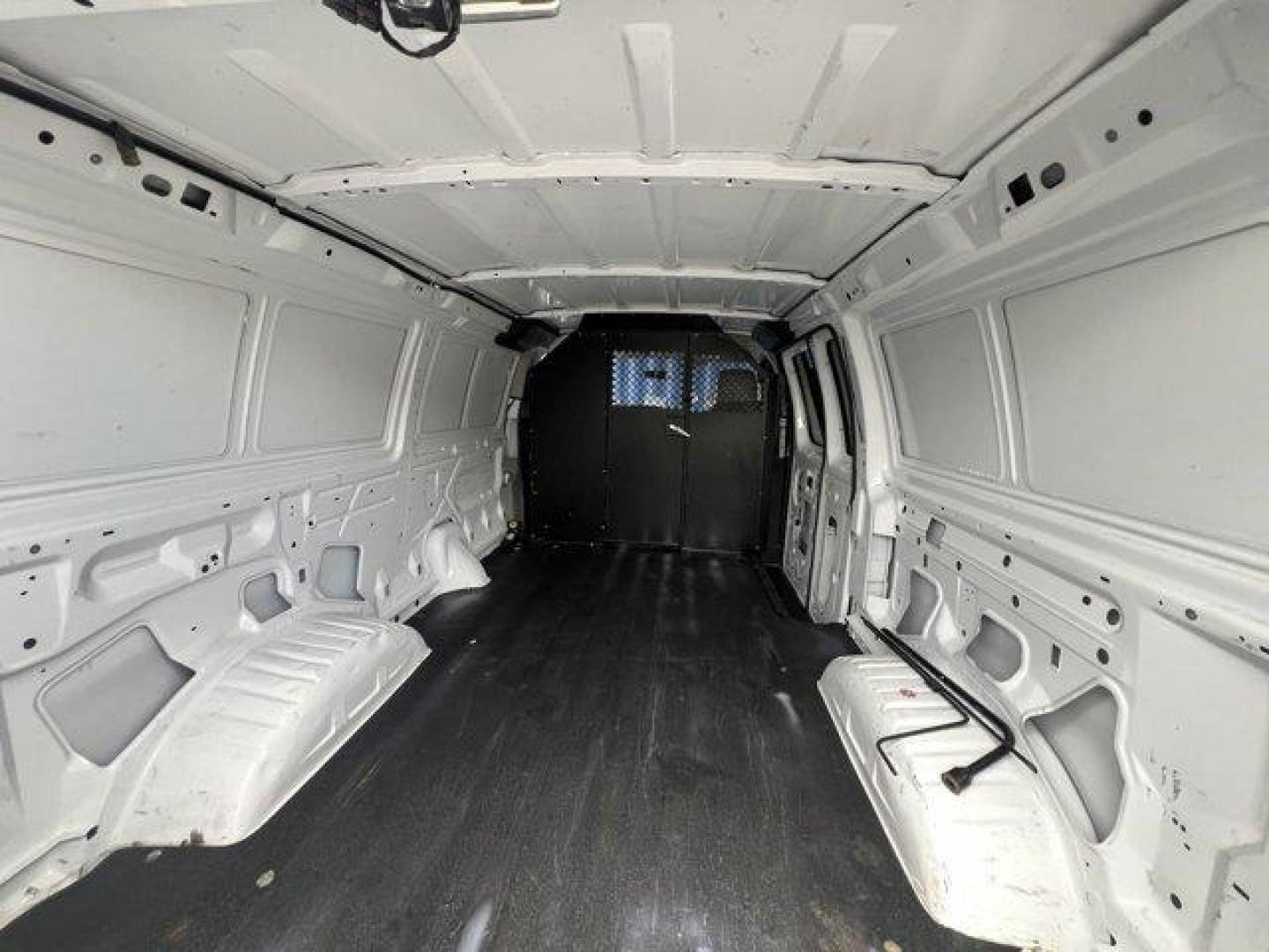 2014 White Ford Econoline Cargo Van (1FTNE2EW9ED) with an 8 4.6 L engine, Automatic transmission, located at 27610 S Dixie Hwy, Homestead, FL, 33032, (305) 749-2348, 25.510241, -80.438301 - KBB.com Brand Image Awards. Only 107,004 Miles! Scores 16 Highway MPG and 13 City MPG! This Ford Econoline Cargo Van boasts a Regular Unleaded V-8 4.6 L/281 engine powering this Automatic transmission. Wheels: 16 x 7 Steel, Variable Intermittent Wipers, Urethane Gear Shifter Material.*This Ford Econ - Photo#14