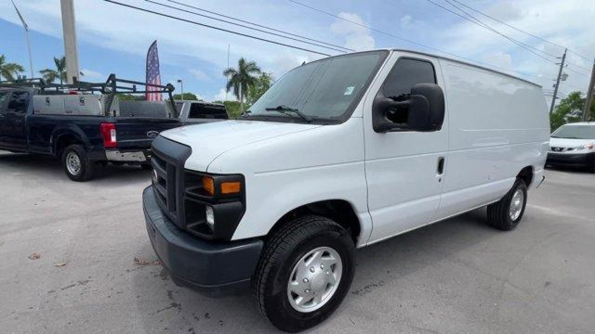 2014 White Ford Econoline Cargo Van (1FTNE2EW9ED) with an 8 4.6 L engine, Automatic transmission, located at 27610 S Dixie Hwy, Homestead, FL, 33032, (305) 749-2348, 25.510241, -80.438301 - KBB.com Brand Image Awards. Only 107,004 Miles! Scores 16 Highway MPG and 13 City MPG! This Ford Econoline Cargo Van boasts a Regular Unleaded V-8 4.6 L/281 engine powering this Automatic transmission. Wheels: 16 x 7 Steel, Variable Intermittent Wipers, Urethane Gear Shifter Material.*This Ford Econ - Photo#0