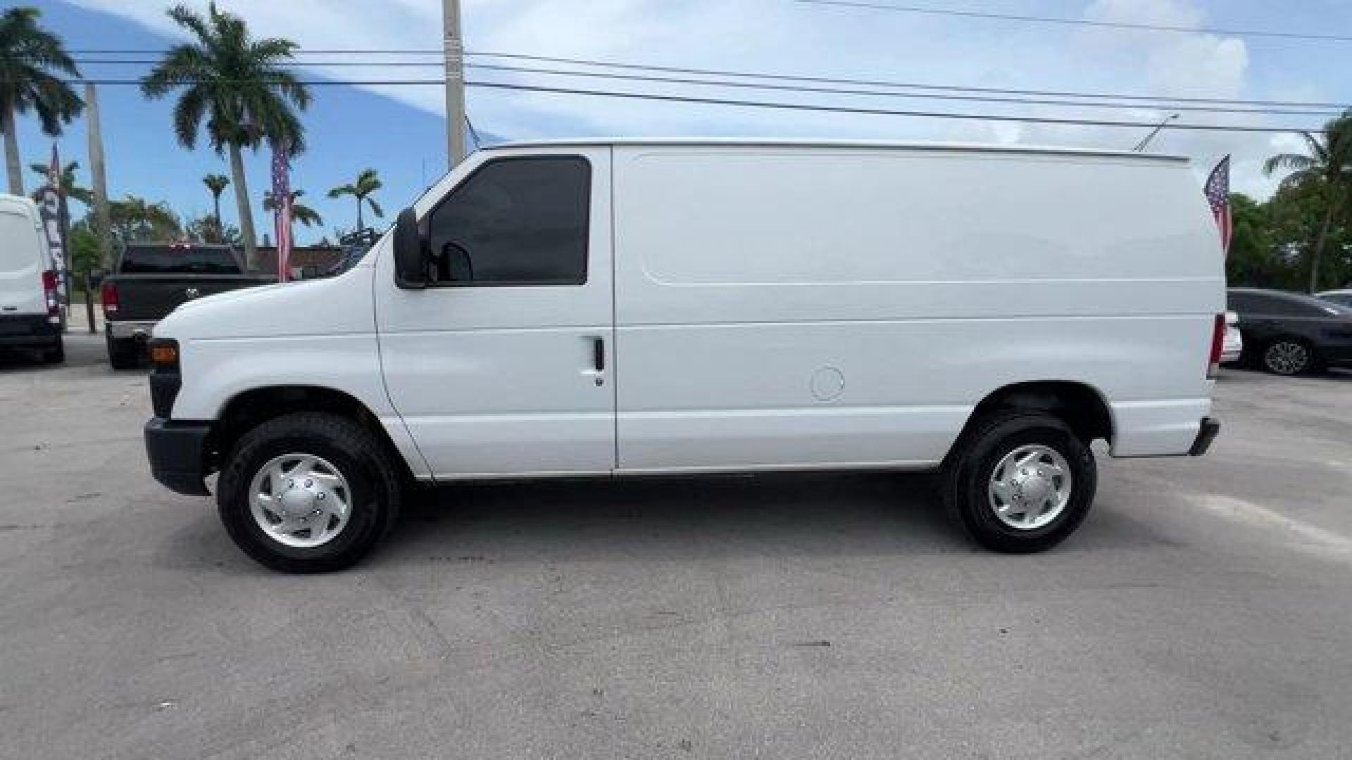 2014 White Ford Econoline Cargo Van (1FTNE2EW9ED) with an 8 4.6 L engine, Automatic transmission, located at 27610 S Dixie Hwy, Homestead, FL, 33032, (305) 749-2348, 25.510241, -80.438301 - KBB.com Brand Image Awards. Only 107,004 Miles! Scores 16 Highway MPG and 13 City MPG! This Ford Econoline Cargo Van boasts a Regular Unleaded V-8 4.6 L/281 engine powering this Automatic transmission. Wheels: 16 x 7 Steel, Variable Intermittent Wipers, Urethane Gear Shifter Material.*This Ford Econ - Photo#1