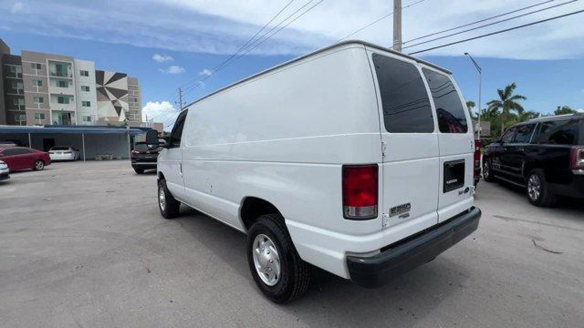 2014 White Ford Econoline Cargo Van (1FTNE2EW9ED) with an 8 4.6 L engine, Automatic transmission, located at 27610 S Dixie Hwy, Homestead, FL, 33032, (305) 749-2348, 25.510241, -80.438301 - KBB.com Brand Image Awards. Only 107,004 Miles! Scores 16 Highway MPG and 13 City MPG! This Ford Econoline Cargo Van boasts a Regular Unleaded V-8 4.6 L/281 engine powering this Automatic transmission. Wheels: 16 x 7 Steel, Variable Intermittent Wipers, Urethane Gear Shifter Material.*This Ford Econ - Photo#2