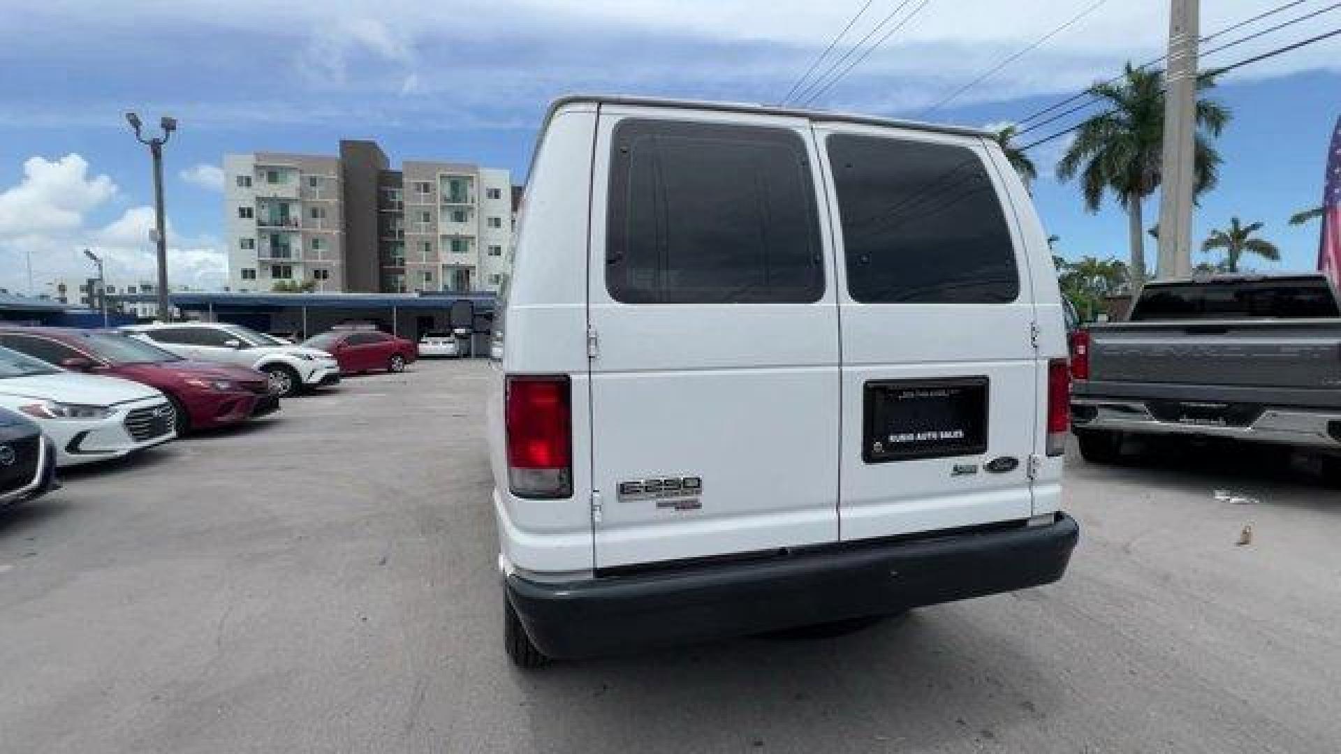 2014 White Ford Econoline Cargo Van (1FTNE2EW9ED) with an 8 4.6 L engine, Automatic transmission, located at 27610 S Dixie Hwy, Homestead, FL, 33032, (305) 749-2348, 25.510241, -80.438301 - KBB.com Brand Image Awards. Only 107,004 Miles! Scores 16 Highway MPG and 13 City MPG! This Ford Econoline Cargo Van boasts a Regular Unleaded V-8 4.6 L/281 engine powering this Automatic transmission. Wheels: 16 x 7 Steel, Variable Intermittent Wipers, Urethane Gear Shifter Material.*This Ford Econ - Photo#3