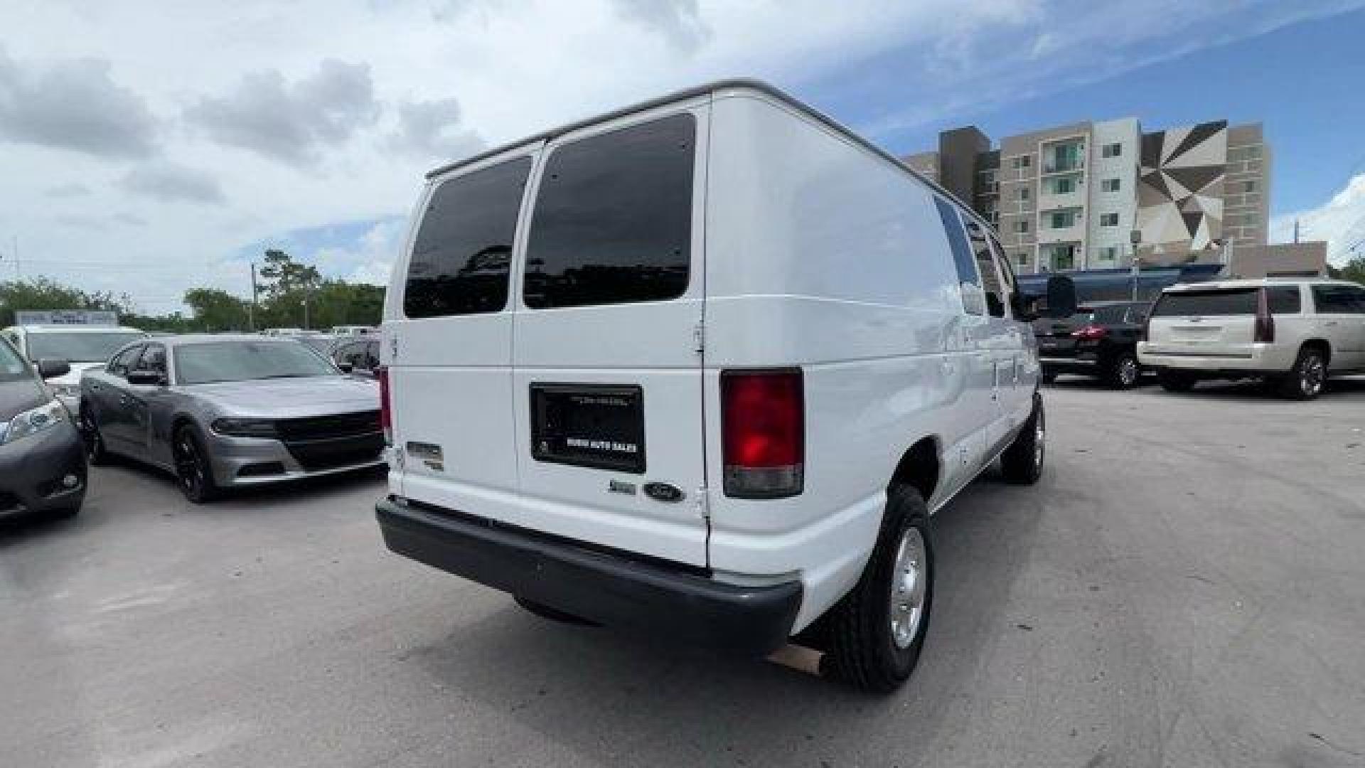 2014 White Ford Econoline Cargo Van (1FTNE2EW9ED) with an 8 4.6 L engine, Automatic transmission, located at 27610 S Dixie Hwy, Homestead, FL, 33032, (305) 749-2348, 25.510241, -80.438301 - KBB.com Brand Image Awards. Only 107,004 Miles! Scores 16 Highway MPG and 13 City MPG! This Ford Econoline Cargo Van boasts a Regular Unleaded V-8 4.6 L/281 engine powering this Automatic transmission. Wheels: 16 x 7 Steel, Variable Intermittent Wipers, Urethane Gear Shifter Material.*This Ford Econ - Photo#4