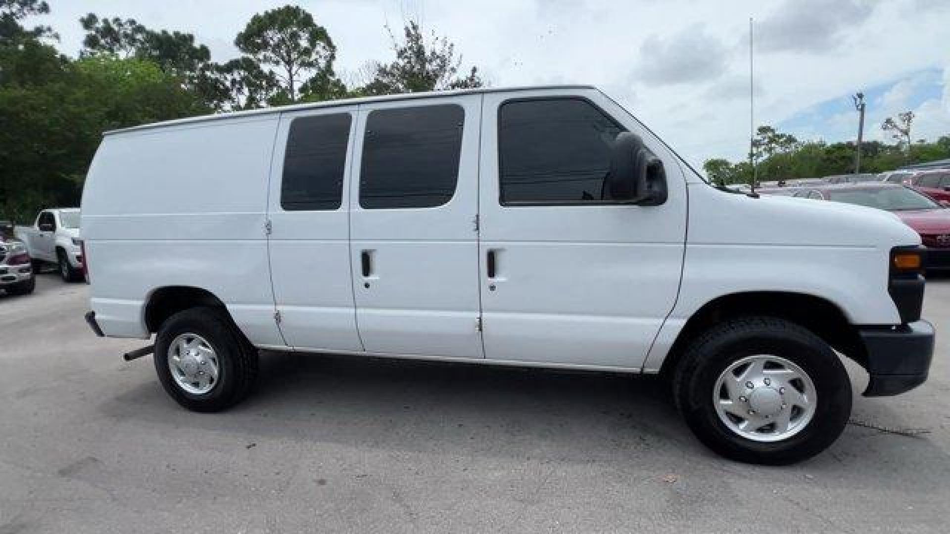 2014 White Ford Econoline Cargo Van (1FTNE2EW9ED) with an 8 4.6 L engine, Automatic transmission, located at 27610 S Dixie Hwy, Homestead, FL, 33032, (305) 749-2348, 25.510241, -80.438301 - KBB.com Brand Image Awards. Only 107,004 Miles! Scores 16 Highway MPG and 13 City MPG! This Ford Econoline Cargo Van boasts a Regular Unleaded V-8 4.6 L/281 engine powering this Automatic transmission. Wheels: 16 x 7 Steel, Variable Intermittent Wipers, Urethane Gear Shifter Material.*This Ford Econ - Photo#5