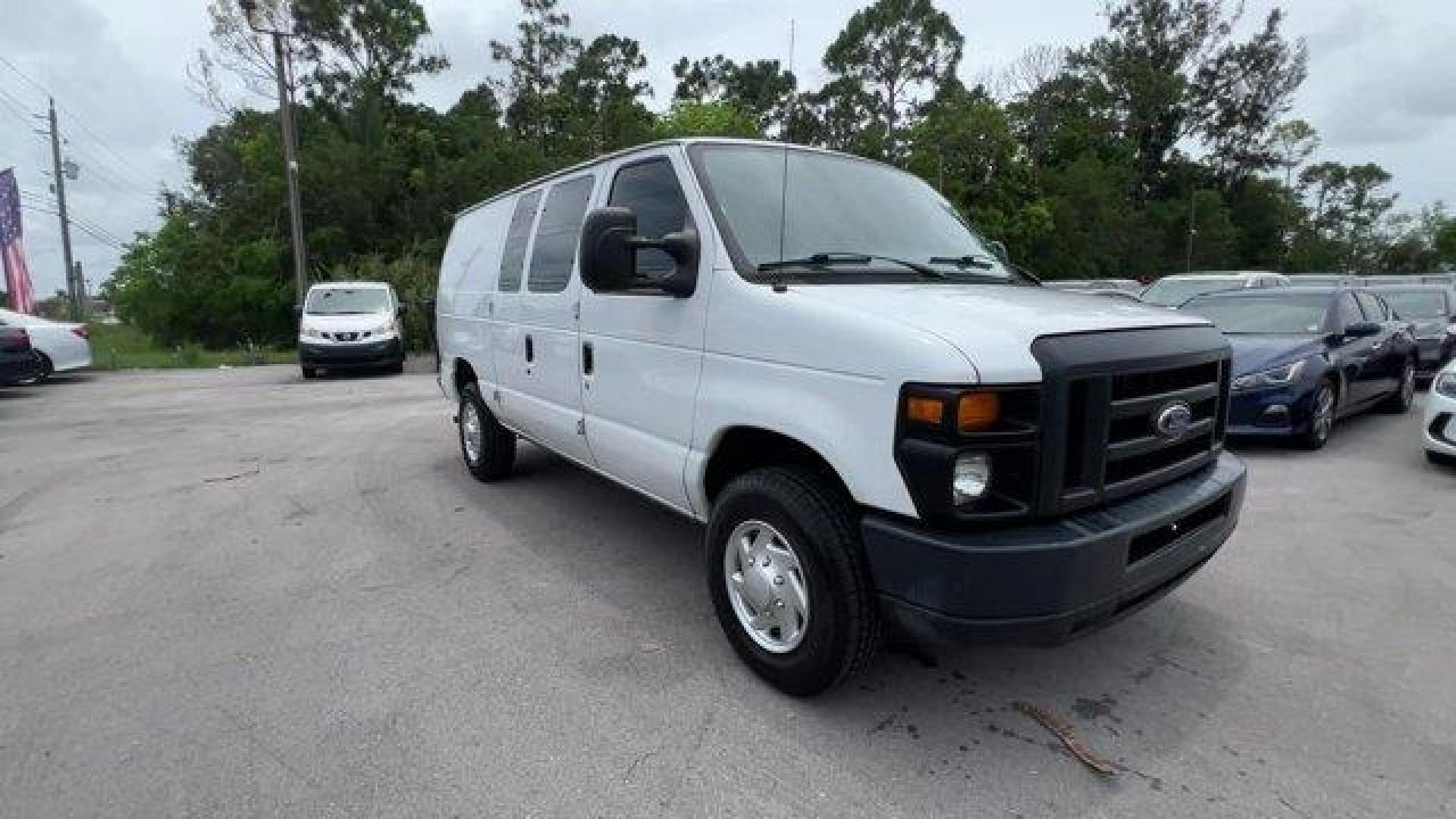 2014 White Ford Econoline Cargo Van (1FTNE2EW9ED) with an 8 4.6 L engine, Automatic transmission, located at 27610 S Dixie Hwy, Homestead, FL, 33032, (305) 749-2348, 25.510241, -80.438301 - KBB.com Brand Image Awards. Only 107,004 Miles! Scores 16 Highway MPG and 13 City MPG! This Ford Econoline Cargo Van boasts a Regular Unleaded V-8 4.6 L/281 engine powering this Automatic transmission. Wheels: 16 x 7 Steel, Variable Intermittent Wipers, Urethane Gear Shifter Material.*This Ford Econ - Photo#6