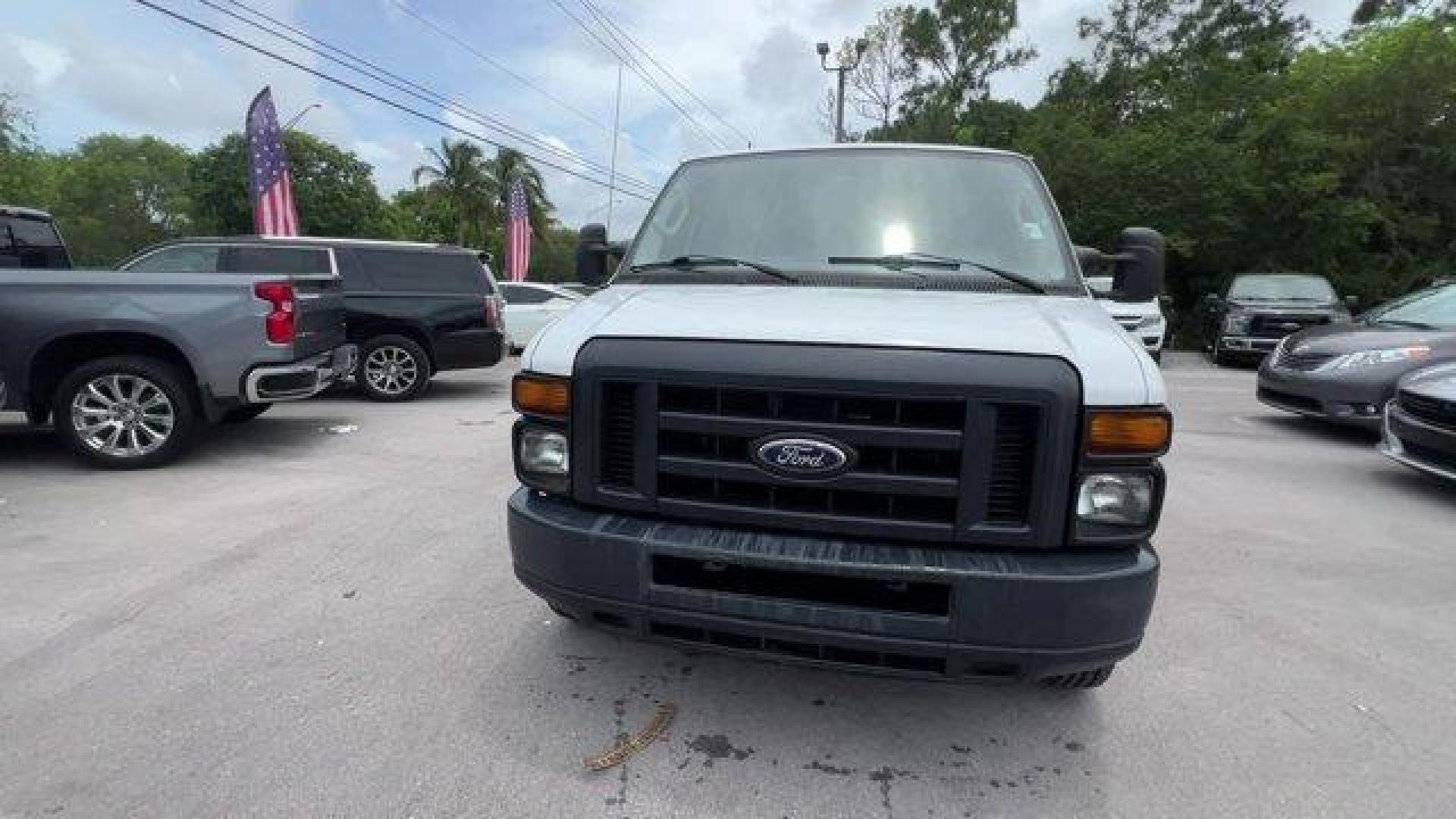 2014 White Ford Econoline Cargo Van (1FTNE2EW9ED) with an 8 4.6 L engine, Automatic transmission, located at 27610 S Dixie Hwy, Homestead, FL, 33032, (305) 749-2348, 25.510241, -80.438301 - KBB.com Brand Image Awards. Only 107,004 Miles! Scores 16 Highway MPG and 13 City MPG! This Ford Econoline Cargo Van boasts a Regular Unleaded V-8 4.6 L/281 engine powering this Automatic transmission. Wheels: 16 x 7 Steel, Variable Intermittent Wipers, Urethane Gear Shifter Material.*This Ford Econ - Photo#7