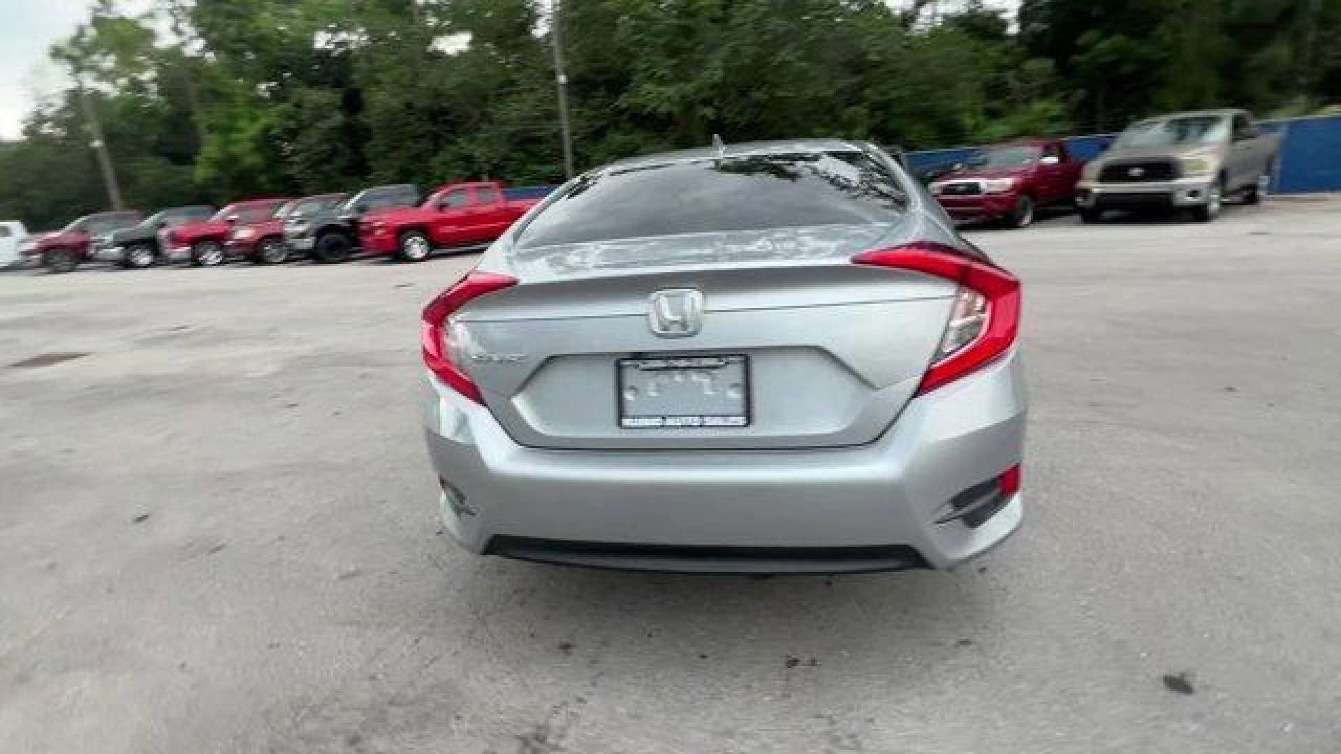 2018 Gray Honda Civic Sedan (2HGFC2F83JH) with an 4 2.0 L engine, Variable transmission, located at 27610 S Dixie Hwy, Homestead, FL, 33032, (305) 749-2348, 25.510241, -80.438301 - KBB.com 10 Most Awarded Brands. Only 56,766 Miles! Boasts 40 Highway MPG and 31 City MPG! This Honda Civic Sedan delivers a Regular Unleaded I-4 2.0 L/122 engine powering this Variable transmission. Wheels: 16 Alloy, Wheels w/Silver Accents, VSA Electronic Stability Control (ESC).*This Honda Civic S - Photo#3