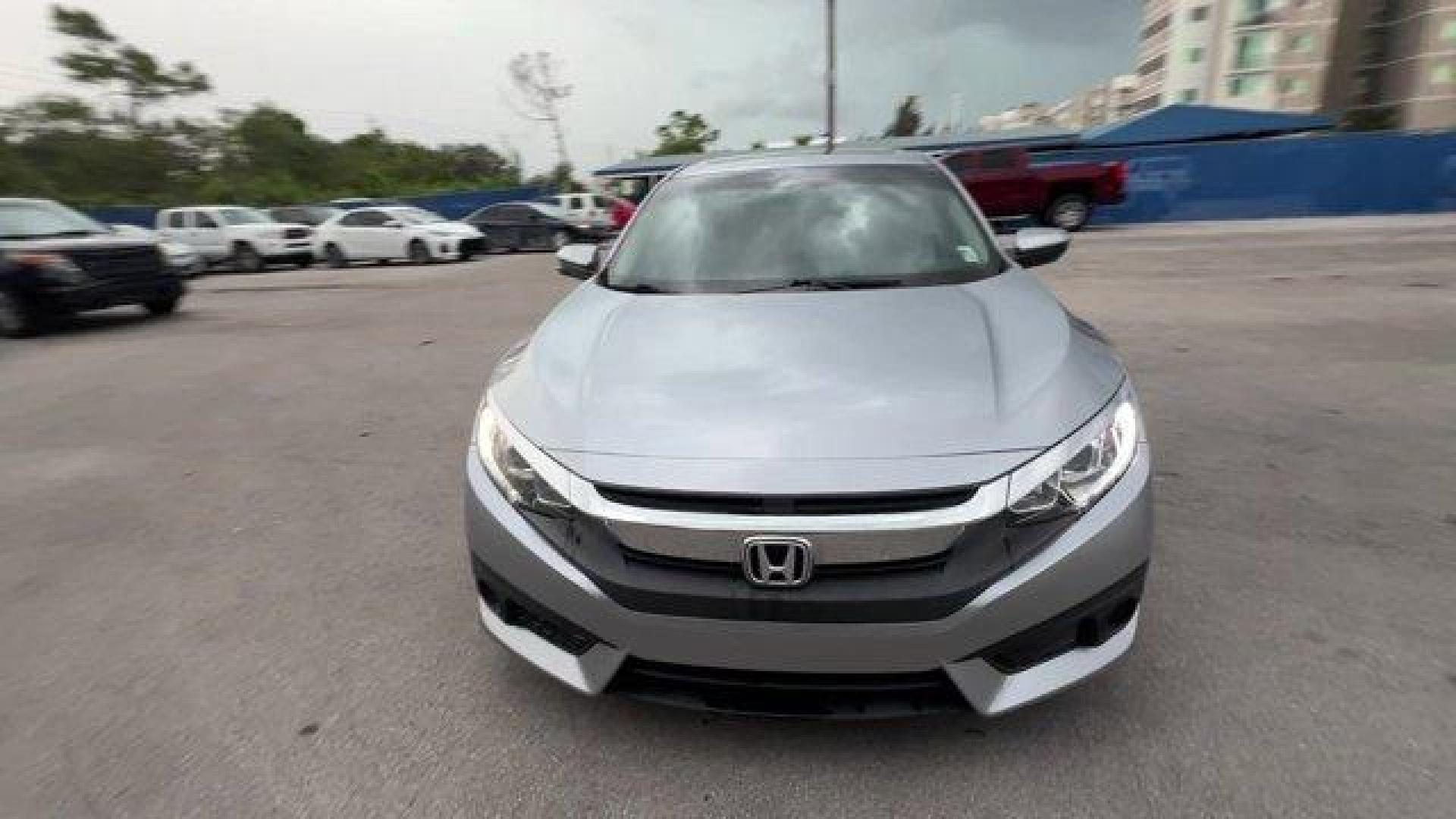 2018 Gray Honda Civic Sedan (2HGFC2F83JH) with an 4 2.0 L engine, Variable transmission, located at 27610 S Dixie Hwy, Homestead, FL, 33032, (305) 749-2348, 25.510241, -80.438301 - KBB.com 10 Most Awarded Brands. Only 56,766 Miles! Boasts 40 Highway MPG and 31 City MPG! This Honda Civic Sedan delivers a Regular Unleaded I-4 2.0 L/122 engine powering this Variable transmission. Wheels: 16 Alloy, Wheels w/Silver Accents, VSA Electronic Stability Control (ESC).*This Honda Civic S - Photo#7