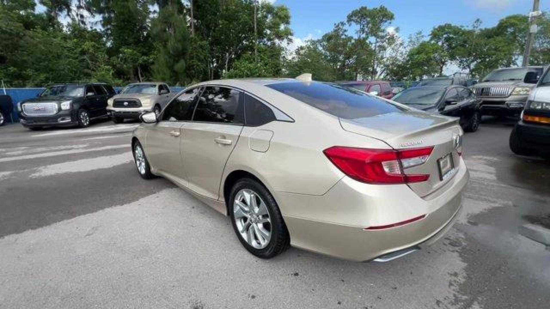 2018 Gold Honda Accord Sedan (1HGCV1F15JA) with an 4 1.5 L engine, Variable transmission, located at 27610 S Dixie Hwy, Homestead, FL, 33032, (305) 749-2348, 25.510241, -80.438301 - ALG Residual Value Awards, Residual Value Awards. Scores 38 Highway MPG and 30 City MPG! This Honda Accord Sedan boasts a Intercooled Turbo Regular Unleaded I-4 1.5 L/91 engine powering this Variable transmission. Wheels: 17 Silver-Painted Alloy, VSA Electronic Stability Control (ESC), Valet Functio - Photo#1