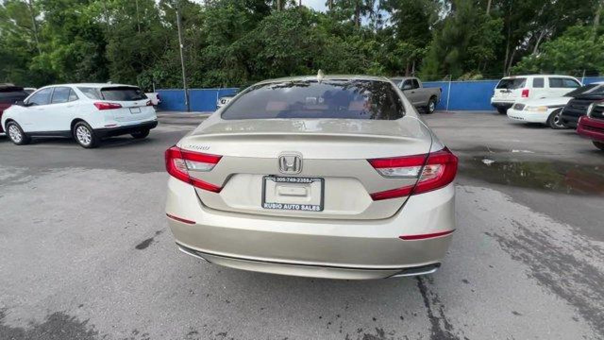 2018 Gold Honda Accord Sedan (1HGCV1F15JA) with an 4 1.5 L engine, Variable transmission, located at 27610 S Dixie Hwy, Homestead, FL, 33032, (305) 749-2348, 25.510241, -80.438301 - ALG Residual Value Awards, Residual Value Awards. Scores 38 Highway MPG and 30 City MPG! This Honda Accord Sedan boasts a Intercooled Turbo Regular Unleaded I-4 1.5 L/91 engine powering this Variable transmission. Wheels: 17 Silver-Painted Alloy, VSA Electronic Stability Control (ESC), Valet Functio - Photo#2