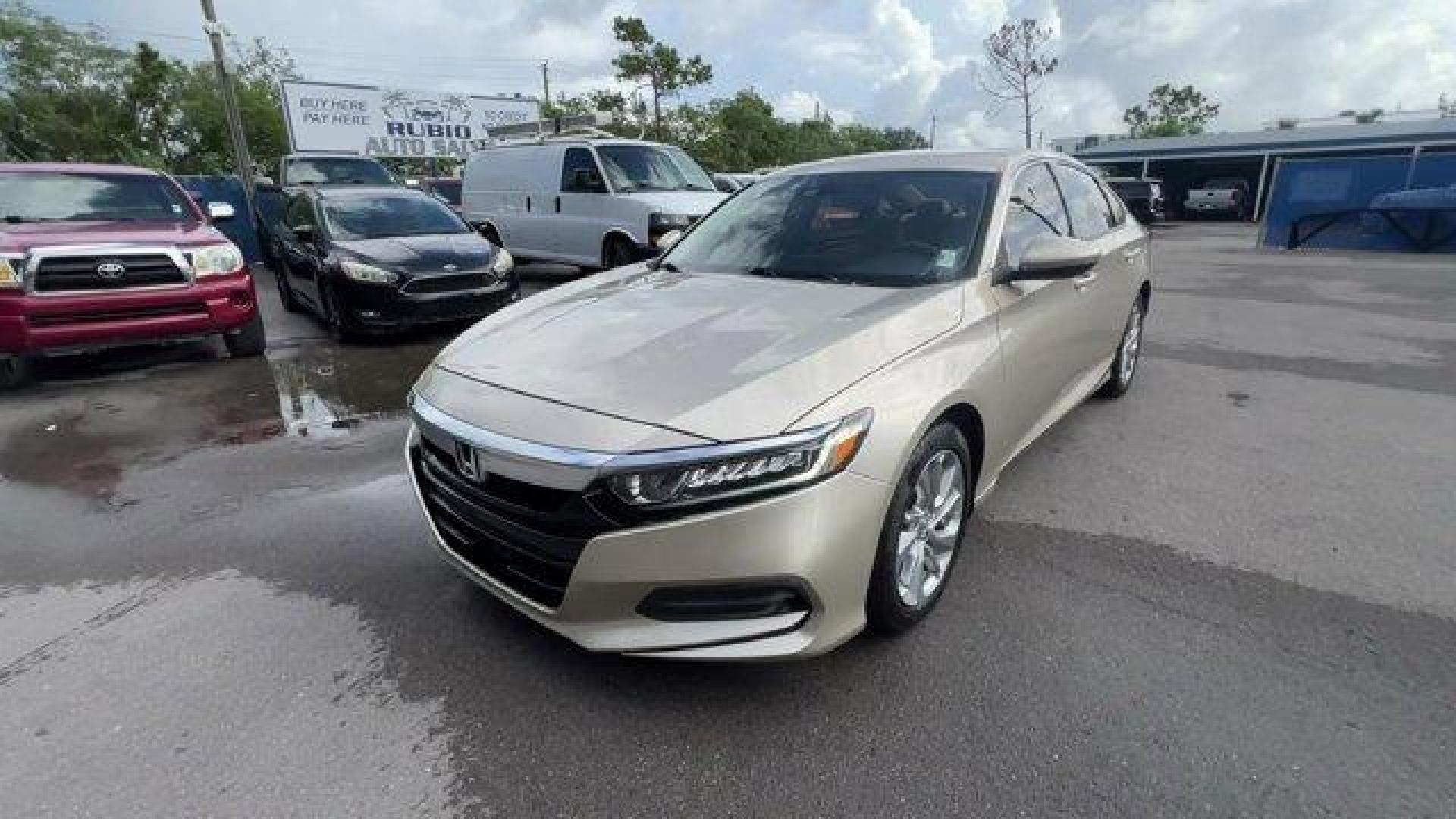 2018 Gold Honda Accord Sedan (1HGCV1F15JA) with an 4 1.5 L engine, Variable transmission, located at 27610 S Dixie Hwy, Homestead, FL, 33032, (305) 749-2348, 25.510241, -80.438301 - ALG Residual Value Awards, Residual Value Awards. Scores 38 Highway MPG and 30 City MPG! This Honda Accord Sedan boasts a Intercooled Turbo Regular Unleaded I-4 1.5 L/91 engine powering this Variable transmission. Wheels: 17 Silver-Painted Alloy, VSA Electronic Stability Control (ESC), Valet Functio - Photo#7