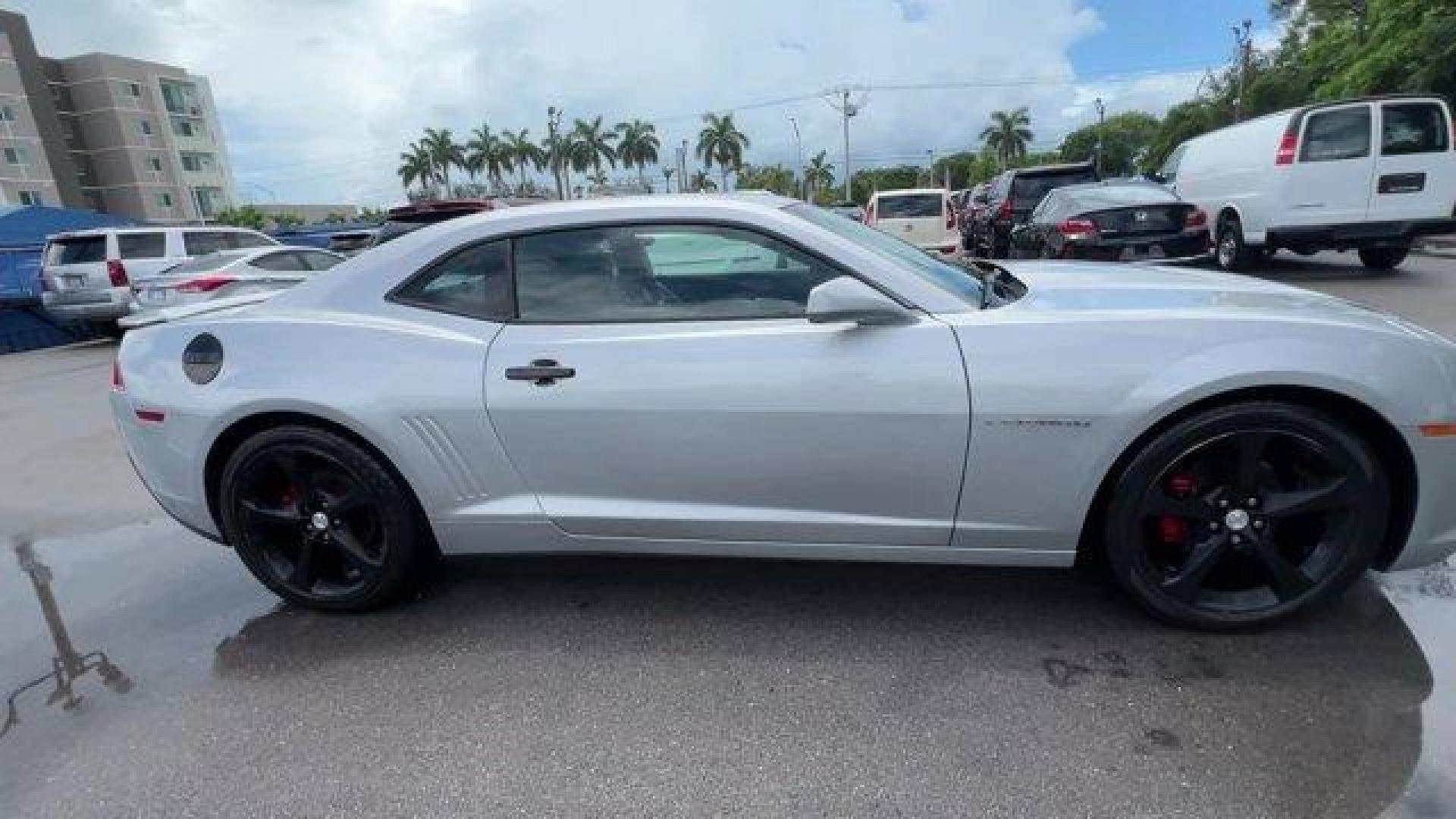 2015 Silver Ice Metallic /Black Chevrolet Camaro (2G1FF1E31F9) with an 6 3.6L engine, Automatic transmission, located at 27610 S Dixie Hwy, Homestead, FL, 33032, (305) 749-2348, 25.510241, -80.438301 - KBB.com Best Buy Awards Finalist. Only 95,974 Miles! Scores 27 Highway MPG and 18 City MPG! This Chevrolet Camaro boasts a Gas V6 3.6L/217 engine powering this Automatic transmission. WHEELS, 20 X 8 (50.8 CM X 20.3 CM) FRONT AND 20 X 9 (50.8 CM X 22.9 CM) REAR FLANGELESS, PAINTED ALUMINUM WITH BRIGH - Photo#5