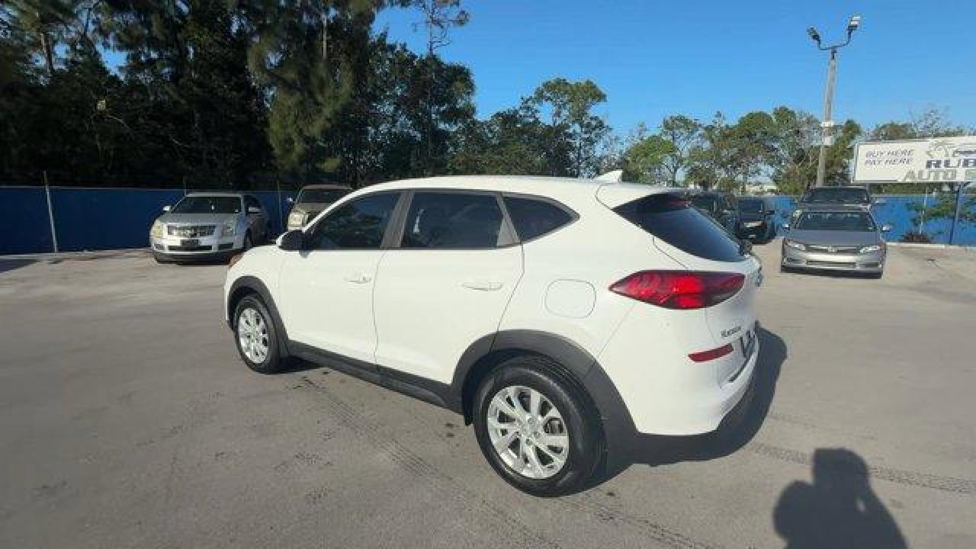 2020 Winter White /Gray Hyundai Tucson (KM8J23A42LU) with an 4 2.0 L engine, Automatic transmission, located at 27610 S Dixie Hwy, Homestead, FL, 33032, (305) 749-2348, 25.510241, -80.438301 - Scores 28 Highway MPG and 23 City MPG! This Hyundai Tucson delivers a Regular Unleaded I-4 2.0 L/122 engine powering this Automatic transmission. WINTER WHITE, REVERSIBLE CARGO TRAY -inc: rubber-like non-slip protective cover for rear cargo compartment, OPTION GROUP 01.*This Hyundai Tucson Comes Equ - Photo#1