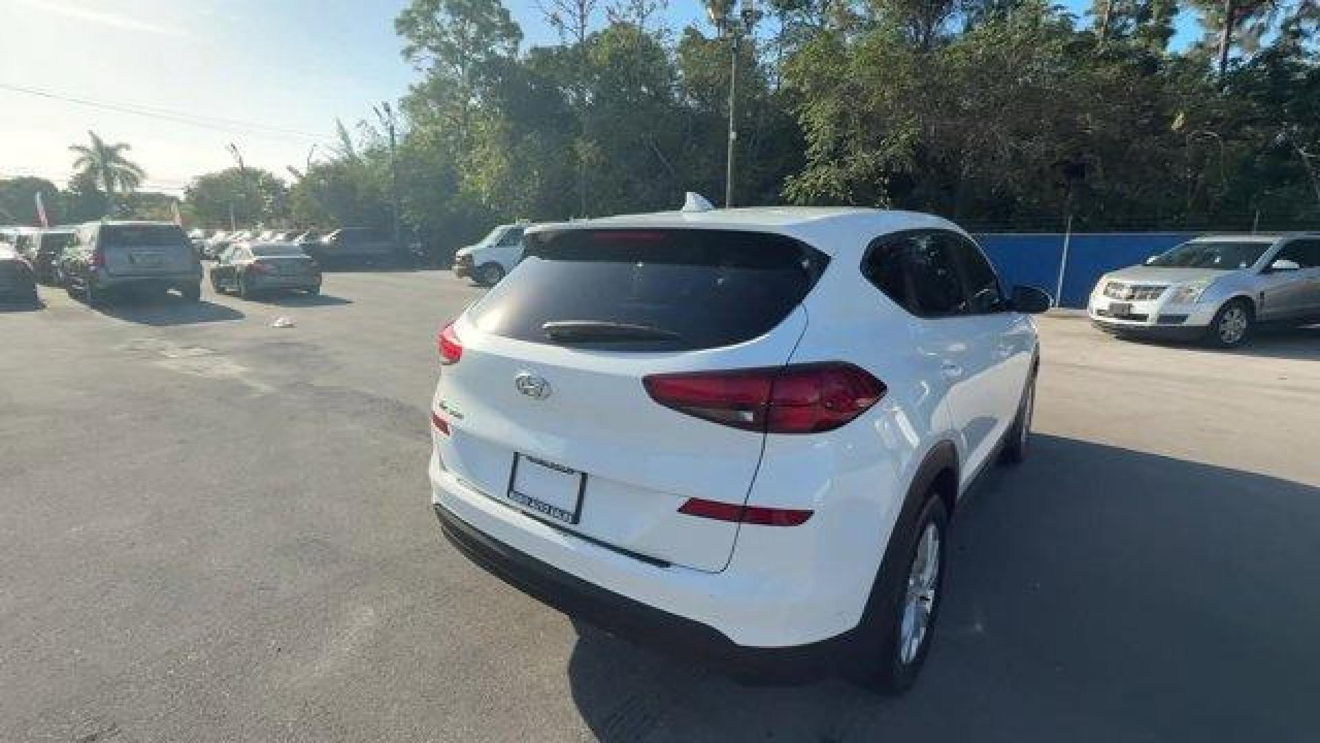 2020 Winter White /Gray Hyundai Tucson (KM8J23A42LU) with an 4 2.0 L engine, Automatic transmission, located at 27610 S Dixie Hwy, Homestead, FL, 33032, (305) 749-2348, 25.510241, -80.438301 - Scores 28 Highway MPG and 23 City MPG! This Hyundai Tucson delivers a Regular Unleaded I-4 2.0 L/122 engine powering this Automatic transmission. WINTER WHITE, REVERSIBLE CARGO TRAY -inc: rubber-like non-slip protective cover for rear cargo compartment, OPTION GROUP 01.*This Hyundai Tucson Comes Equ - Photo#3