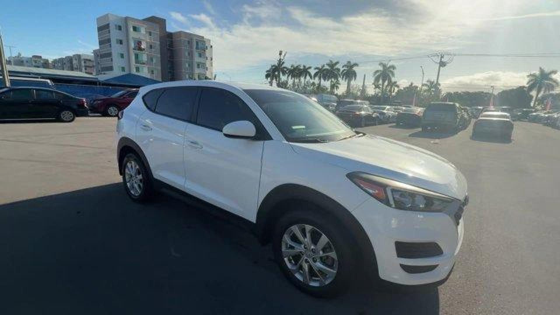 2020 Winter White /Gray Hyundai Tucson (KM8J23A42LU) with an 4 2.0 L engine, Automatic transmission, located at 27610 S Dixie Hwy, Homestead, FL, 33032, (305) 749-2348, 25.510241, -80.438301 - Scores 28 Highway MPG and 23 City MPG! This Hyundai Tucson delivers a Regular Unleaded I-4 2.0 L/122 engine powering this Automatic transmission. WINTER WHITE, REVERSIBLE CARGO TRAY -inc: rubber-like non-slip protective cover for rear cargo compartment, OPTION GROUP 01.*This Hyundai Tucson Comes Equ - Photo#5