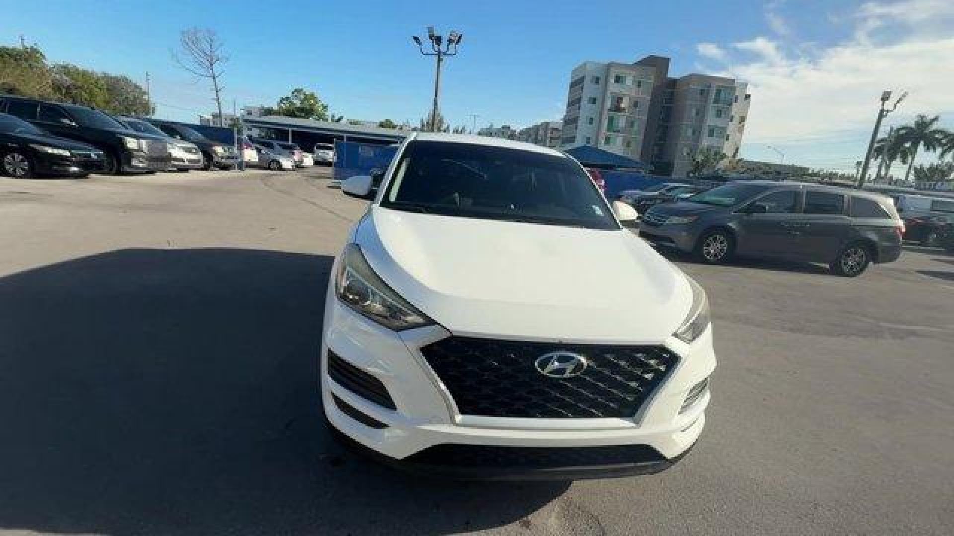 2020 Winter White /Gray Hyundai Tucson (KM8J23A42LU) with an 4 2.0 L engine, Automatic transmission, located at 27610 S Dixie Hwy, Homestead, FL, 33032, (305) 749-2348, 25.510241, -80.438301 - Scores 28 Highway MPG and 23 City MPG! This Hyundai Tucson delivers a Regular Unleaded I-4 2.0 L/122 engine powering this Automatic transmission. WINTER WHITE, REVERSIBLE CARGO TRAY -inc: rubber-like non-slip protective cover for rear cargo compartment, OPTION GROUP 01.*This Hyundai Tucson Comes Equ - Photo#6