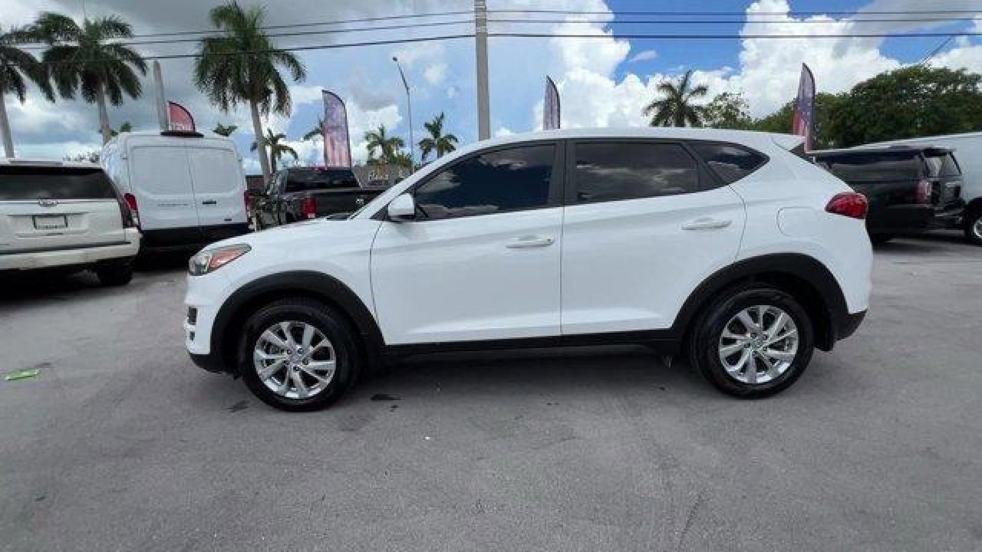 2020 Winter White /Gray Hyundai Tucson (KM8J23A42LU) with an 4 2.0 L engine, Automatic transmission, located at 27610 S Dixie Hwy, Homestead, FL, 33032, (305) 749-2348, 25.510241, -80.438301 - Scores 28 Highway MPG and 23 City MPG! This Hyundai Tucson delivers a Regular Unleaded I-4 2.0 L/122 engine powering this Automatic transmission. WINTER WHITE, REVERSIBLE CARGO TRAY -inc: rubber-like non-slip protective cover for rear cargo compartment, OPTION GROUP 01.*This Hyundai Tucson Comes Equ - Photo#0