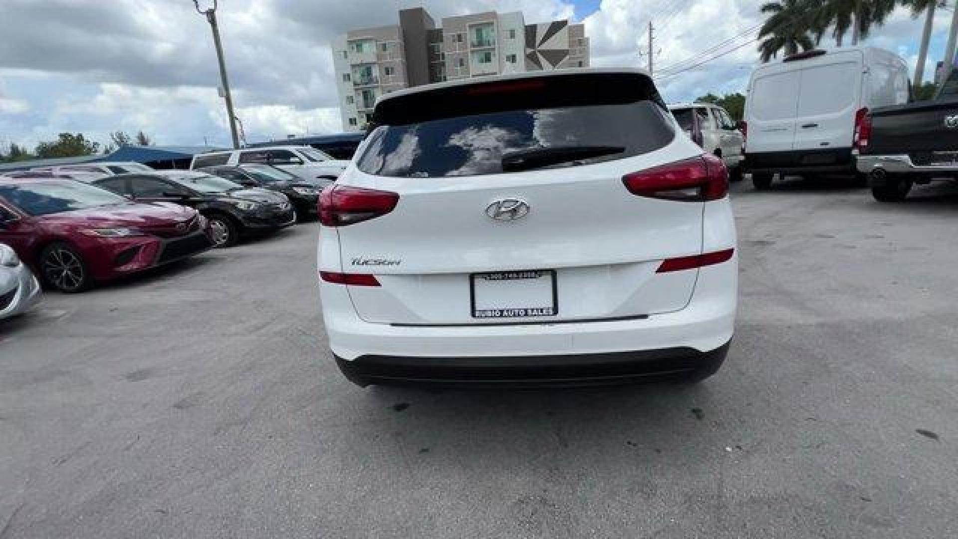 2020 Winter White /Gray Hyundai Tucson (KM8J23A42LU) with an 4 2.0 L engine, Automatic transmission, located at 27610 S Dixie Hwy, Homestead, FL, 33032, (305) 749-2348, 25.510241, -80.438301 - Scores 28 Highway MPG and 23 City MPG! This Hyundai Tucson delivers a Regular Unleaded I-4 2.0 L/122 engine powering this Automatic transmission. WINTER WHITE, REVERSIBLE CARGO TRAY -inc: rubber-like non-slip protective cover for rear cargo compartment, OPTION GROUP 01.*This Hyundai Tucson Comes Equ - Photo#2