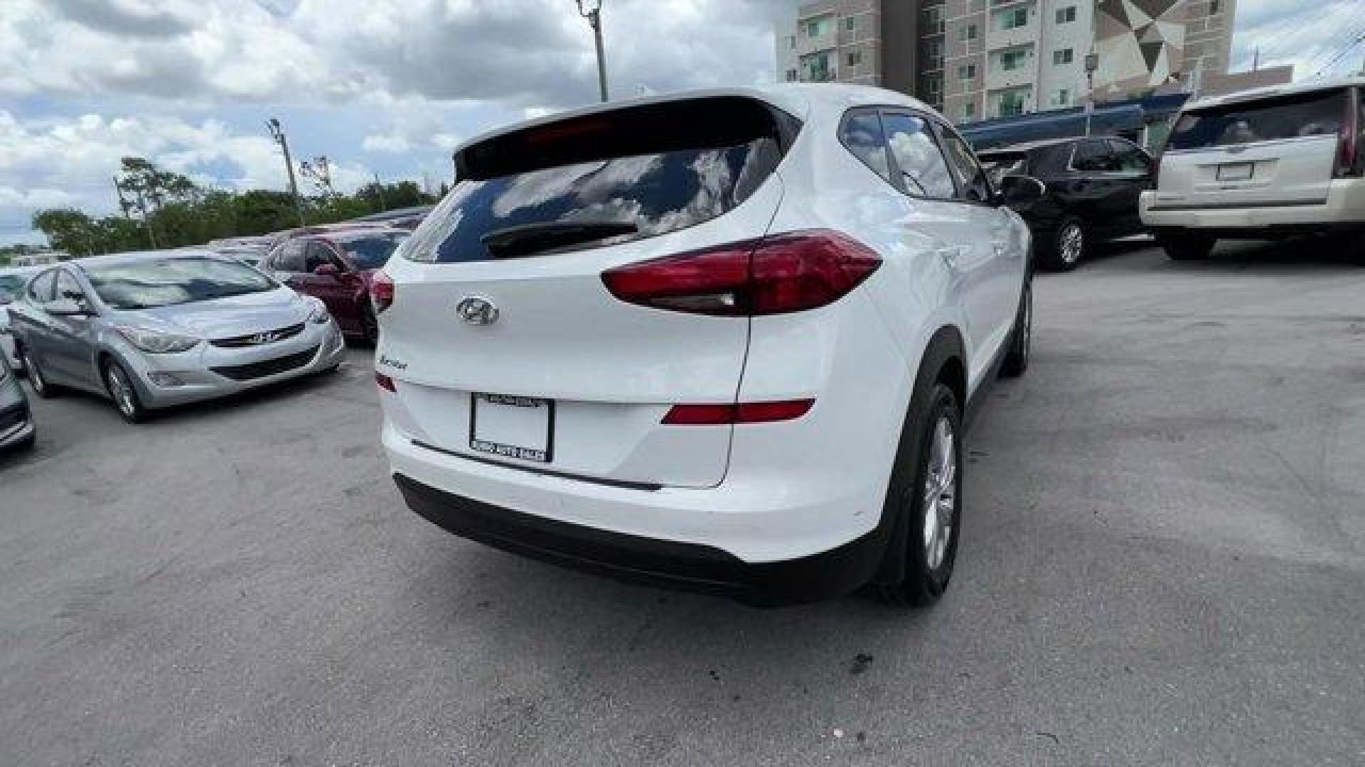 2020 Winter White /Gray Hyundai Tucson (KM8J23A42LU) with an 4 2.0 L engine, Automatic transmission, located at 27610 S Dixie Hwy, Homestead, FL, 33032, (305) 749-2348, 25.510241, -80.438301 - Scores 28 Highway MPG and 23 City MPG! This Hyundai Tucson delivers a Regular Unleaded I-4 2.0 L/122 engine powering this Automatic transmission. WINTER WHITE, REVERSIBLE CARGO TRAY -inc: rubber-like non-slip protective cover for rear cargo compartment, OPTION GROUP 01.*This Hyundai Tucson Comes Equ - Photo#3