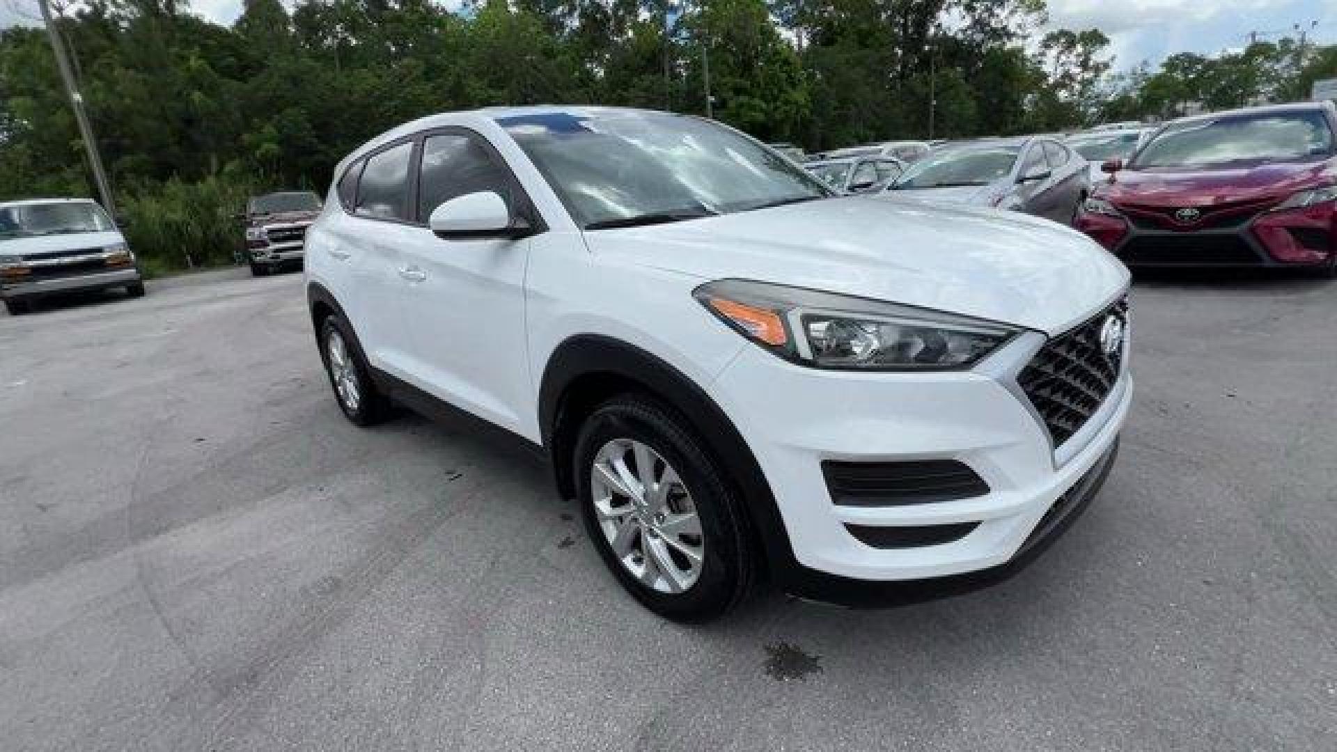 2020 Winter White /Gray Hyundai Tucson (KM8J23A42LU) with an 4 2.0 L engine, Automatic transmission, located at 27610 S Dixie Hwy, Homestead, FL, 33032, (305) 749-2348, 25.510241, -80.438301 - Scores 28 Highway MPG and 23 City MPG! This Hyundai Tucson delivers a Regular Unleaded I-4 2.0 L/122 engine powering this Automatic transmission. WINTER WHITE, REVERSIBLE CARGO TRAY -inc: rubber-like non-slip protective cover for rear cargo compartment, OPTION GROUP 01.*This Hyundai Tucson Comes Equ - Photo#5