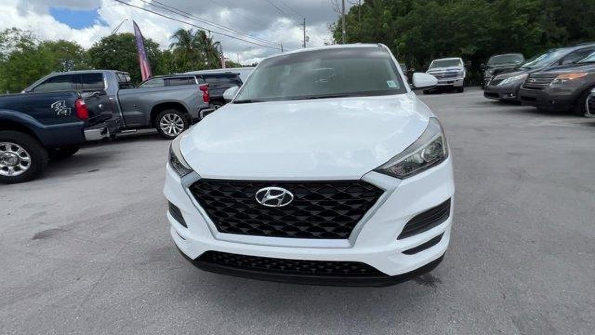 2020 Winter White /Gray Hyundai Tucson (KM8J23A42LU) with an 4 2.0 L engine, Automatic transmission, located at 27610 S Dixie Hwy, Homestead, FL, 33032, (305) 749-2348, 25.510241, -80.438301 - Scores 28 Highway MPG and 23 City MPG! This Hyundai Tucson delivers a Regular Unleaded I-4 2.0 L/122 engine powering this Automatic transmission. WINTER WHITE, REVERSIBLE CARGO TRAY -inc: rubber-like non-slip protective cover for rear cargo compartment, OPTION GROUP 01.*This Hyundai Tucson Comes Equ - Photo#6