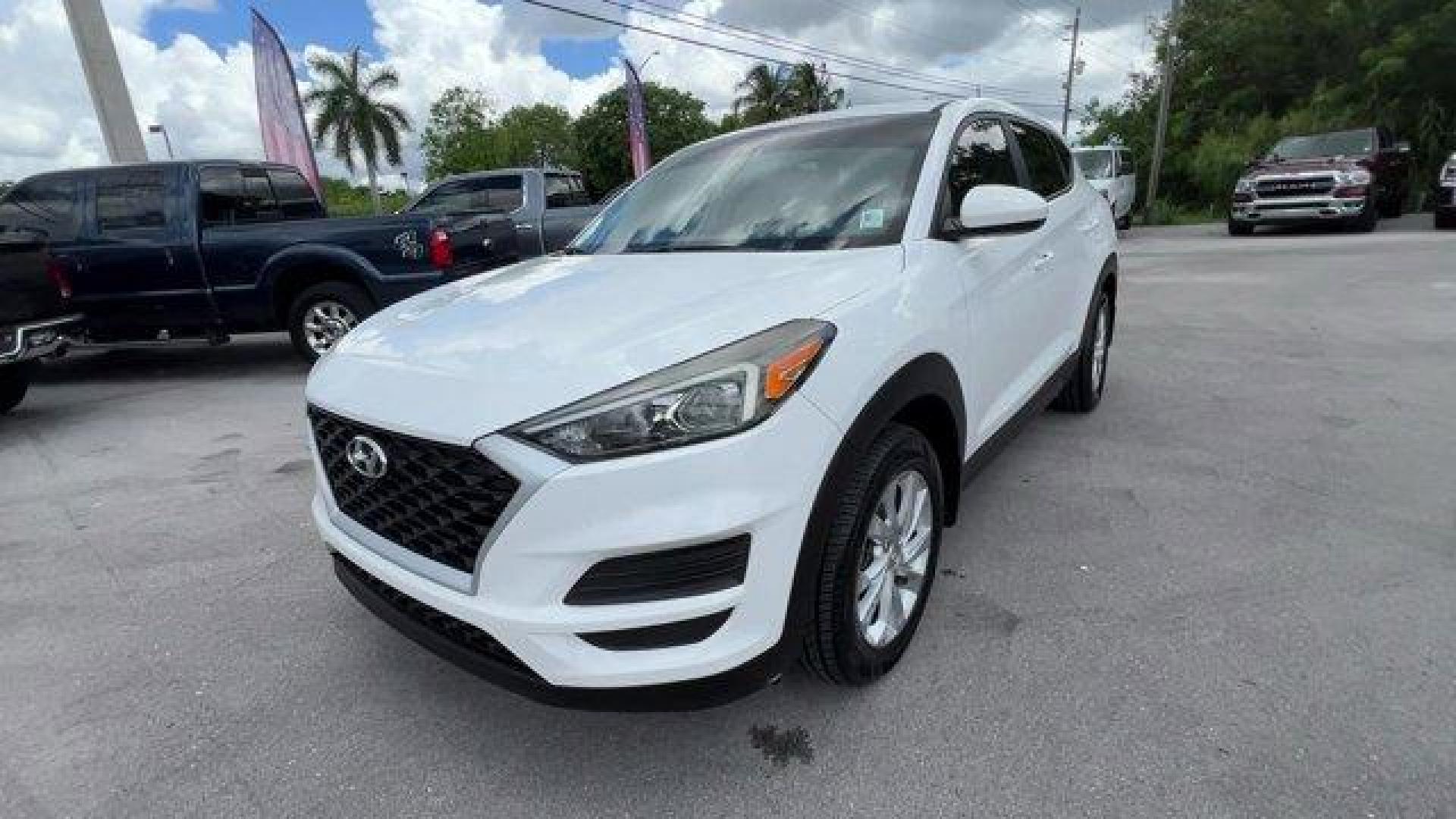 2020 Winter White /Gray Hyundai Tucson (KM8J23A42LU) with an 4 2.0 L engine, Automatic transmission, located at 27610 S Dixie Hwy, Homestead, FL, 33032, (305) 749-2348, 25.510241, -80.438301 - Scores 28 Highway MPG and 23 City MPG! This Hyundai Tucson delivers a Regular Unleaded I-4 2.0 L/122 engine powering this Automatic transmission. WINTER WHITE, REVERSIBLE CARGO TRAY -inc: rubber-like non-slip protective cover for rear cargo compartment, OPTION GROUP 01.*This Hyundai Tucson Comes Equ - Photo#7