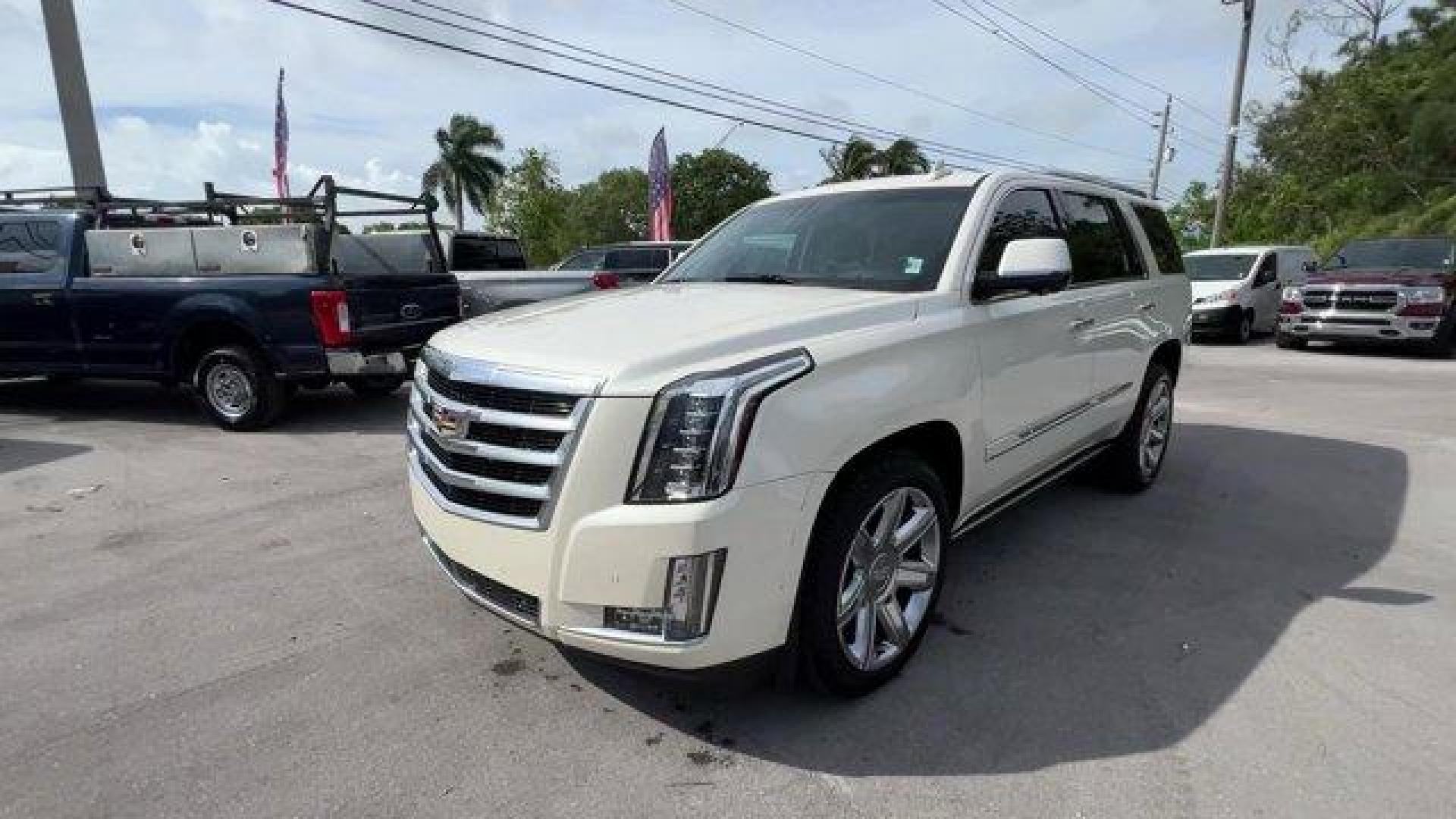 2015 White Diamond Tricoat /Jet Black Cadillac Escalade (1GYS3NKJ4FR) with an 8 6.2L engine, Automatic transmission, located at 27610 S Dixie Hwy, Homestead, FL, 33032, (305) 749-2348, 25.510241, -80.438301 - KBB.com 10 Best Luxury SUVs. Only 101,127 Miles! Delivers 22 Highway MPG and 15 City MPG! This Cadillac Escalade delivers a Gas V8 6.2L/376 engine powering this Automatic transmission. WHITE DIAMOND TRICOAT, WHEELS, 22 X 9 (55.9 CM X 22.9 CM) 7-SPOKE ALUMINUM WITH PREMIUM PAINT AND CHROME INSERTS (U - Photo#0